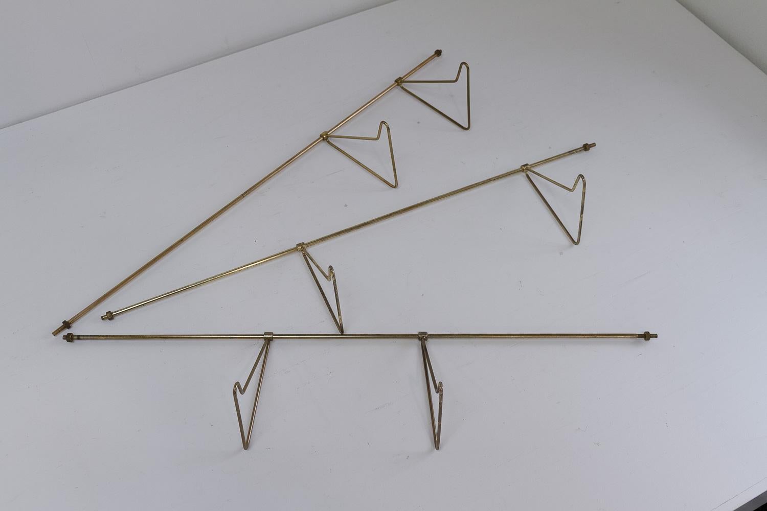Mid-20th Century Danish Brass Bookends Royal by Poul Cadovius for Cado, 1960s. Set of 3. For Sale