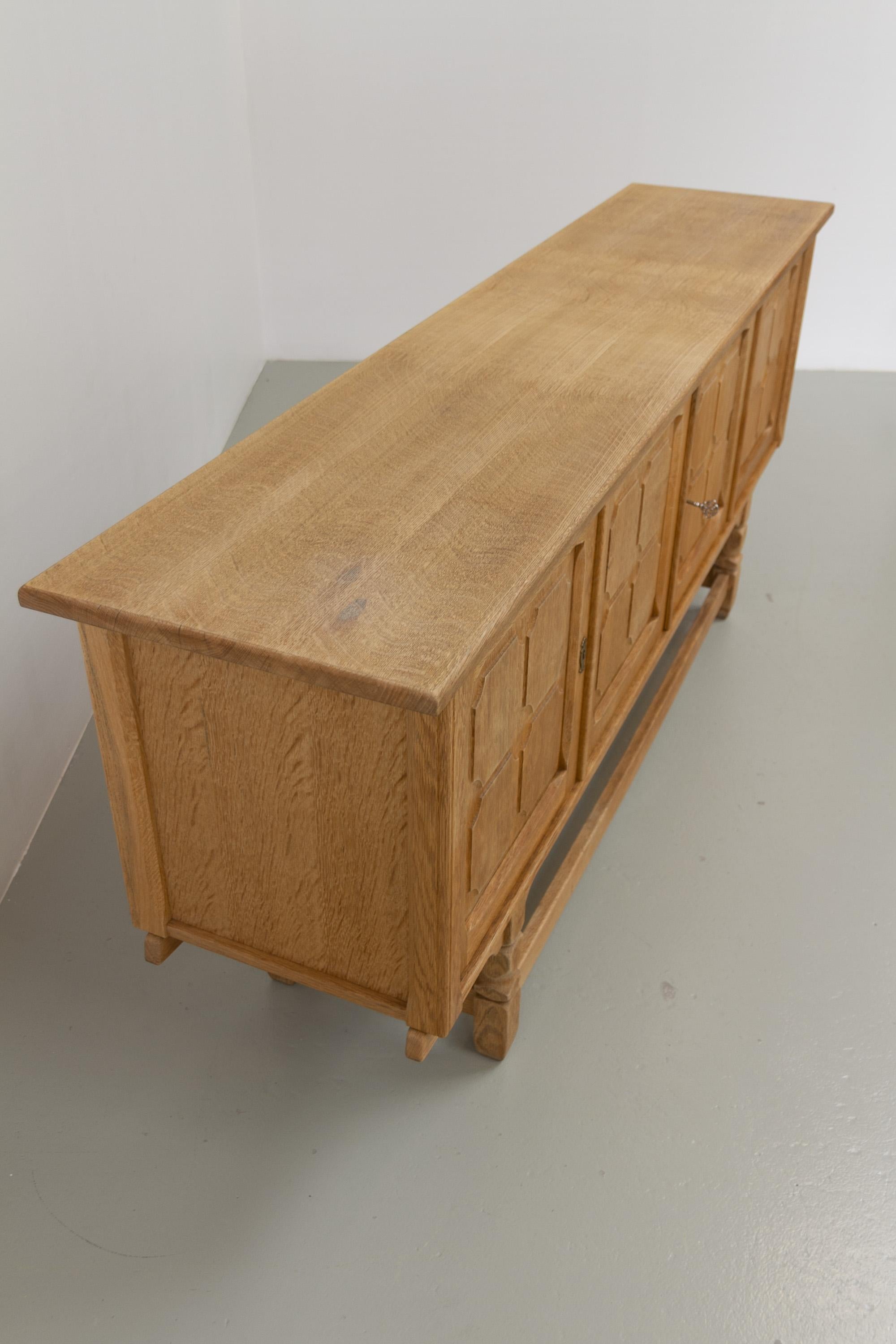 Danish Brutalist Low Oak Sideboard attributed to Henning Kjærnulf, 1960s. For Sale 9