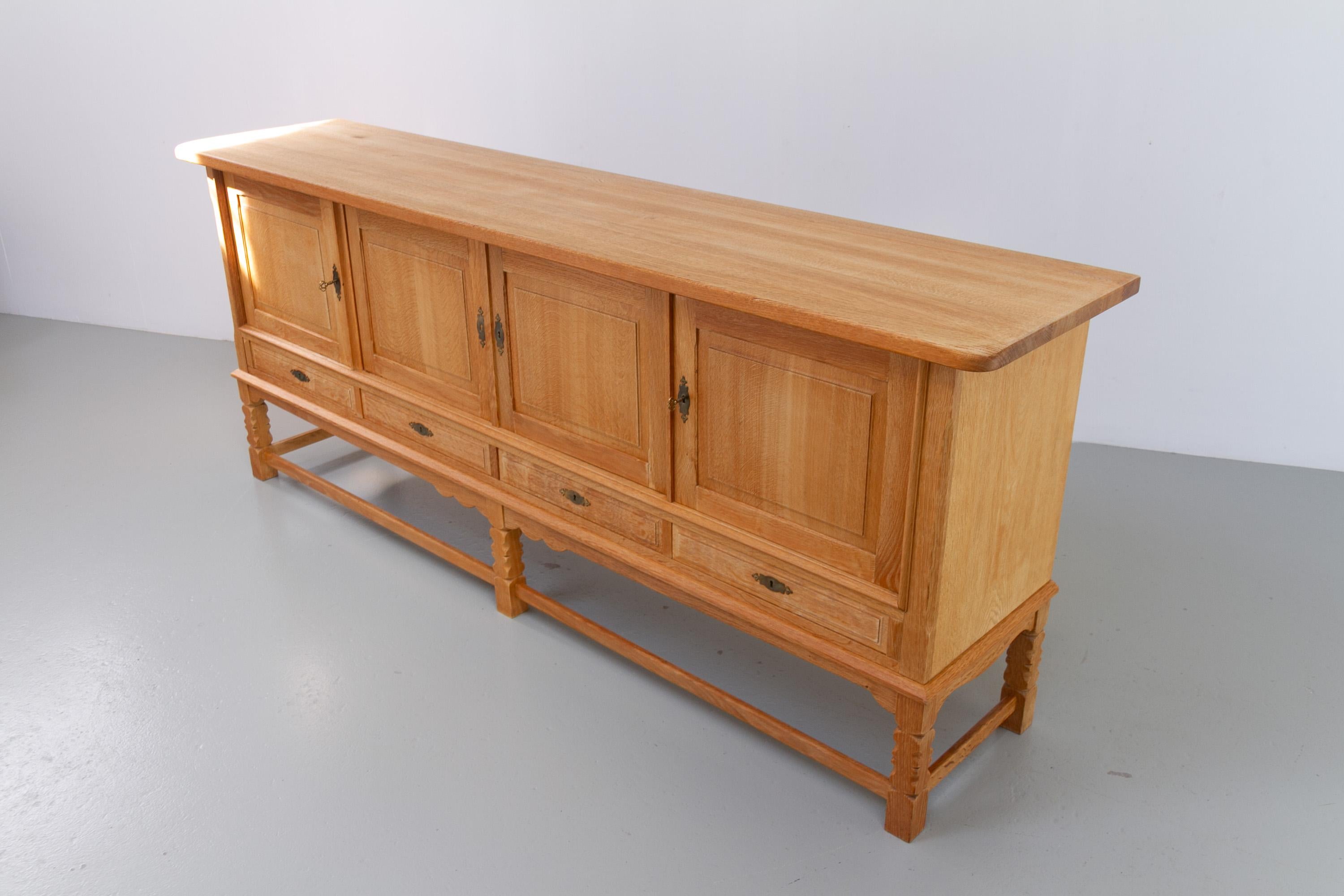 Danish Brutalist Low Oak Sideboard attributed to Henning Kjærnulf, 1960s. For Sale 9