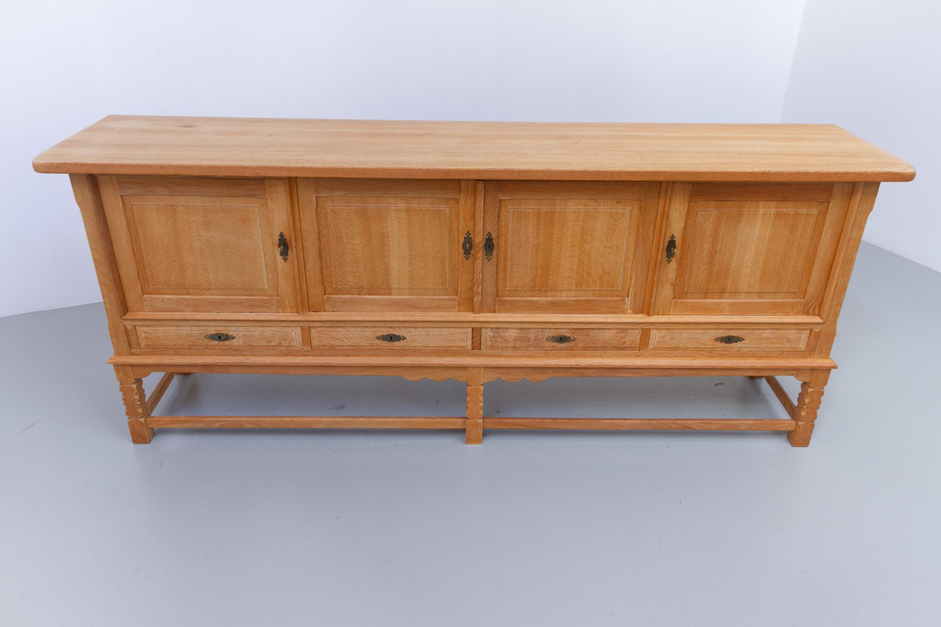 Danish Brutalist Low Oak Sideboard attributed to Henning Kjærnulf, 1960s. For Sale 10
