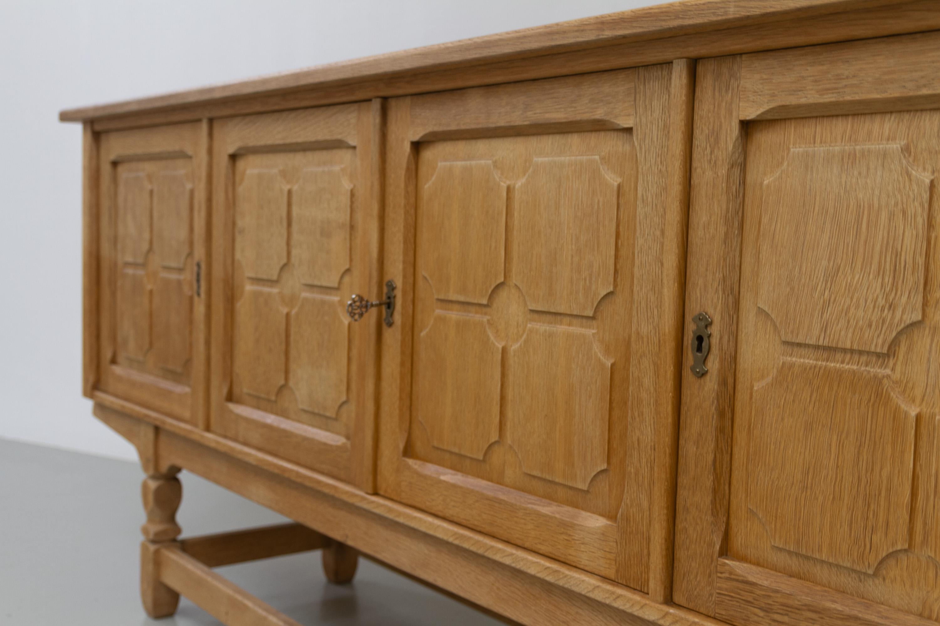 Danish Brutalist Low Oak Sideboard attributed to Henning Kjærnulf, 1960s. For Sale 11