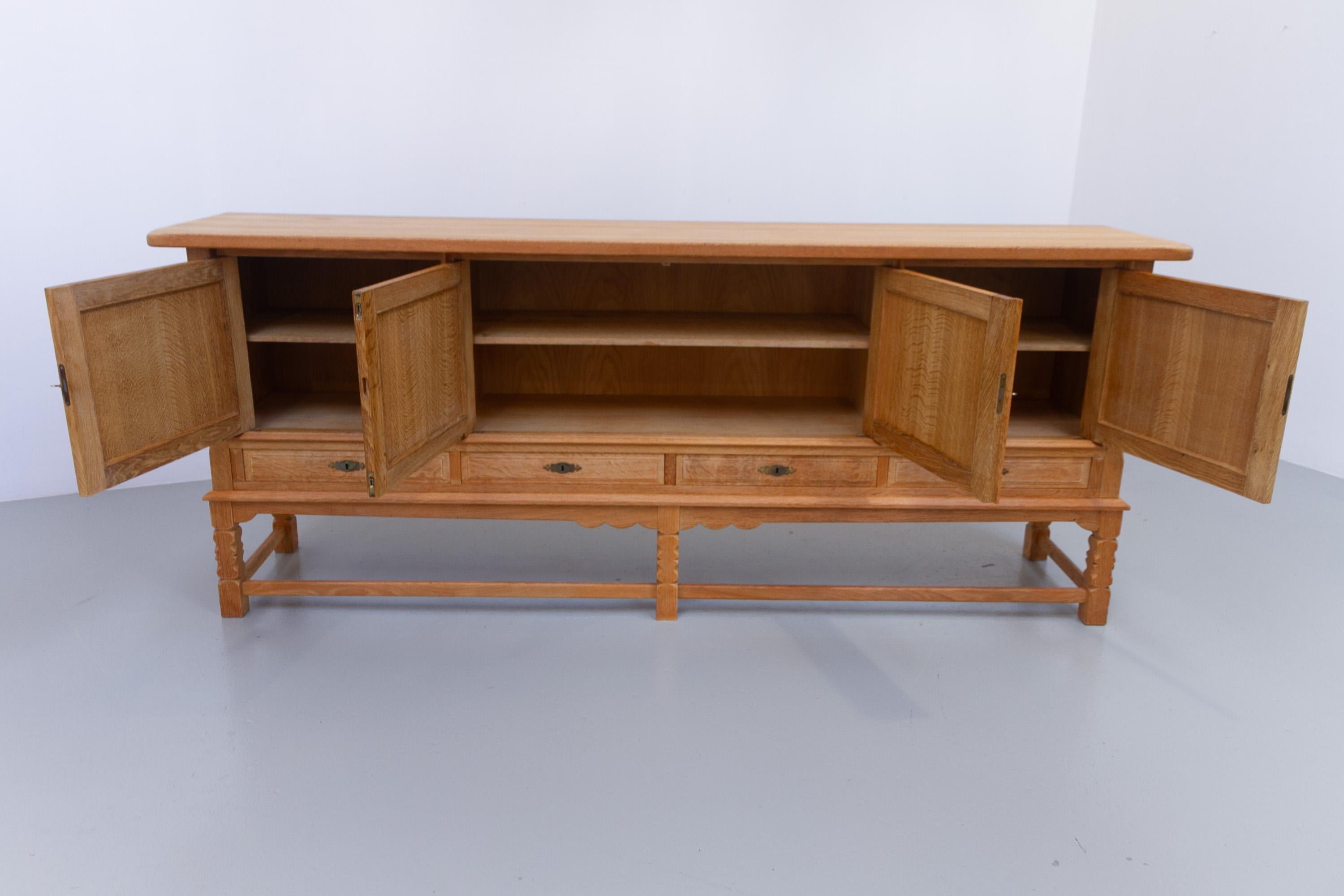 Danish Brutalist Low Oak Sideboard attributed to Henning Kjærnulf, 1960s. For Sale 11