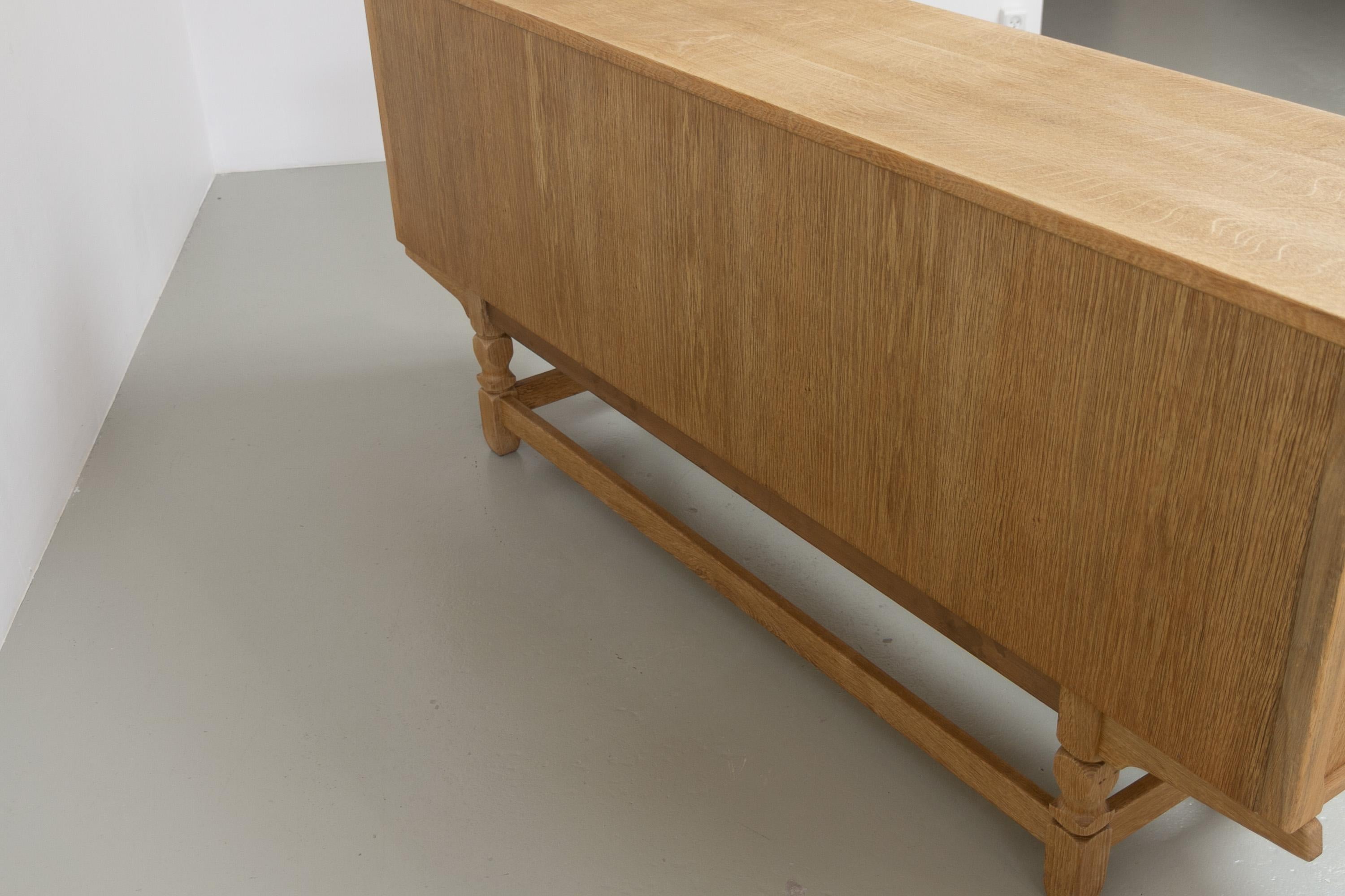 Danish Brutalist Low Oak Sideboard attributed to Henning Kjærnulf, 1960s. For Sale 12