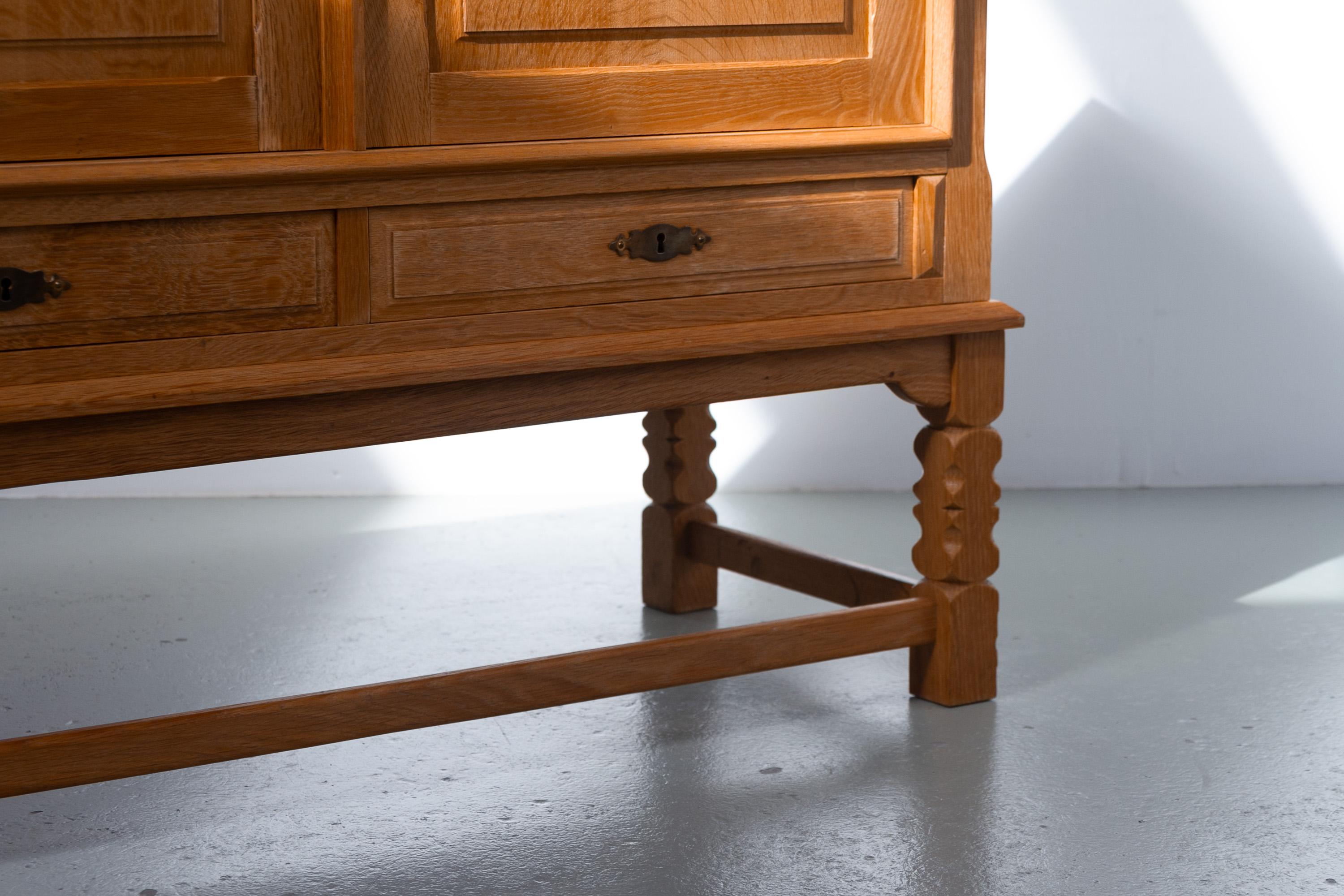 Mid-20th Century Danish Brutalist Low Oak Sideboard attributed to Henning Kjærnulf, 1960s. For Sale