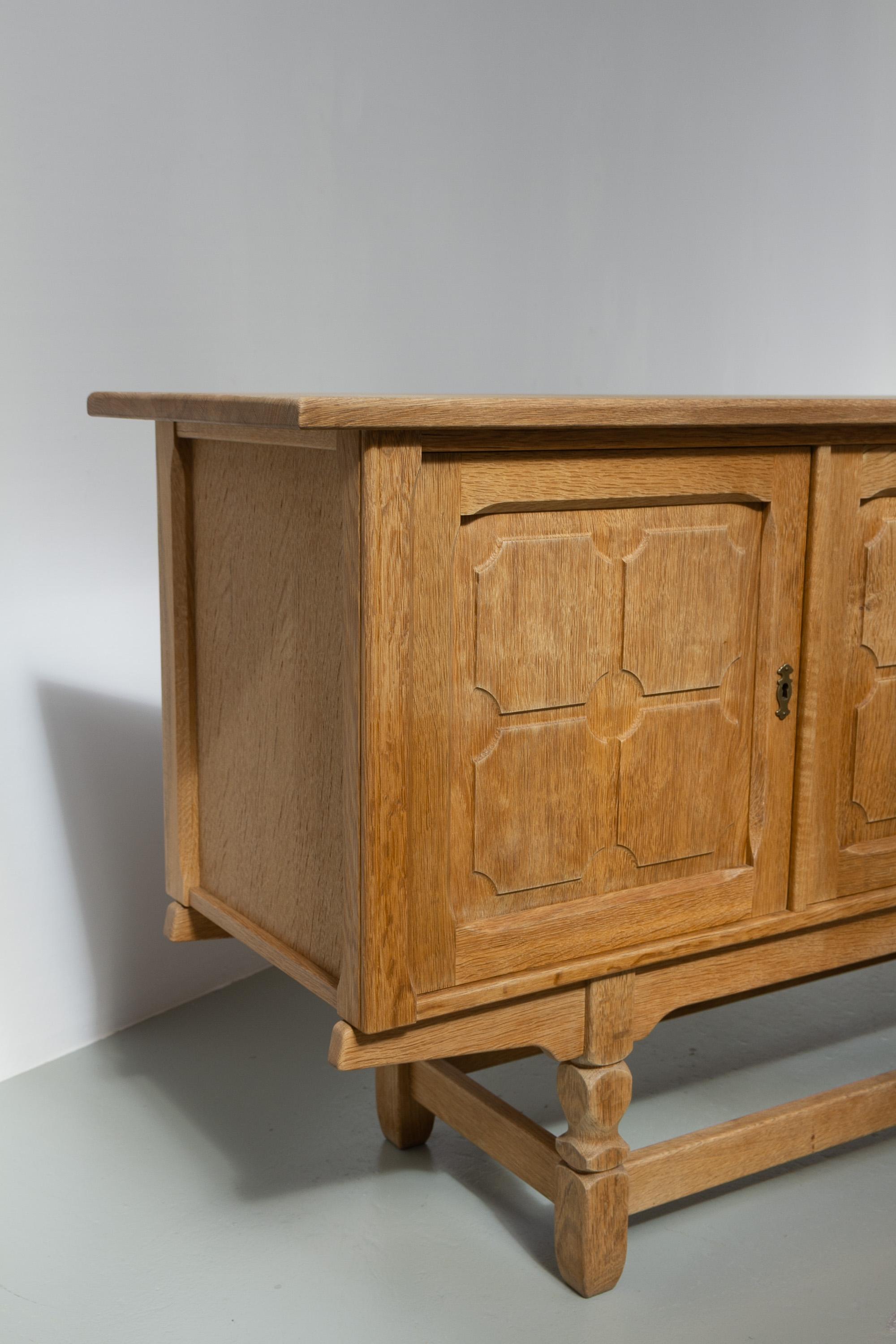 Danish Brutalist Low Oak Sideboard attributed to Henning Kjærnulf, 1960s. For Sale 1