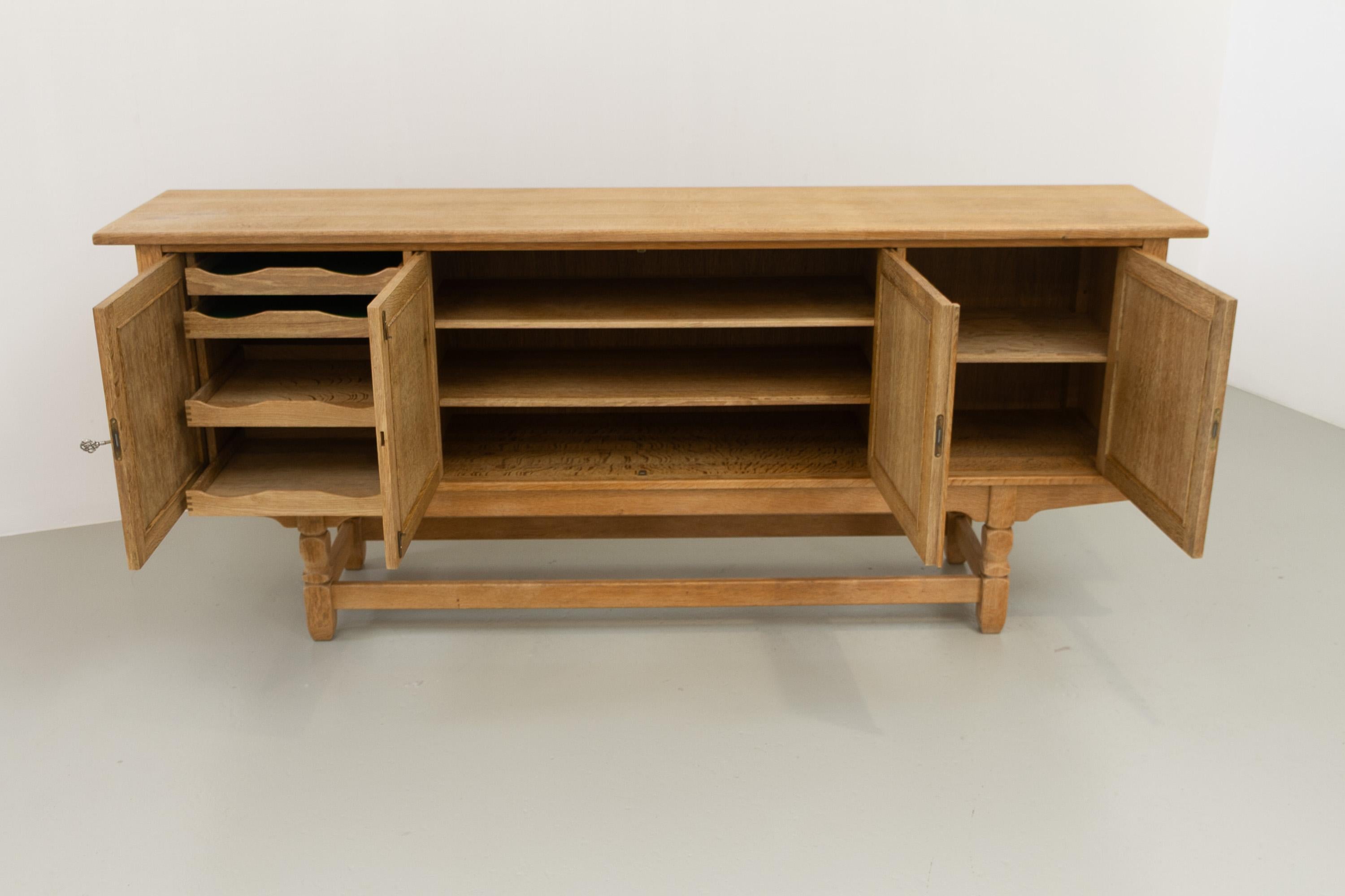 Danish Brutalist Low Oak Sideboard attributed to Henning Kjærnulf, 1960s. For Sale 3