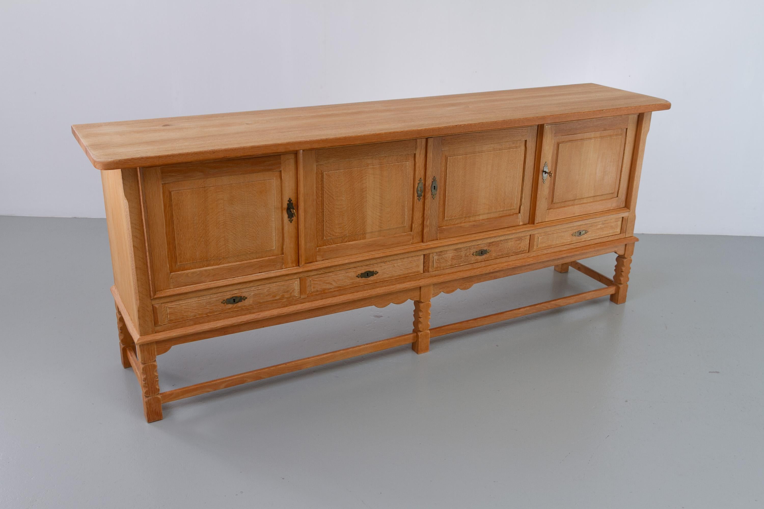 Danish Brutalist Low Oak Sideboard attributed to Henning Kjærnulf, 1960s. For Sale 3