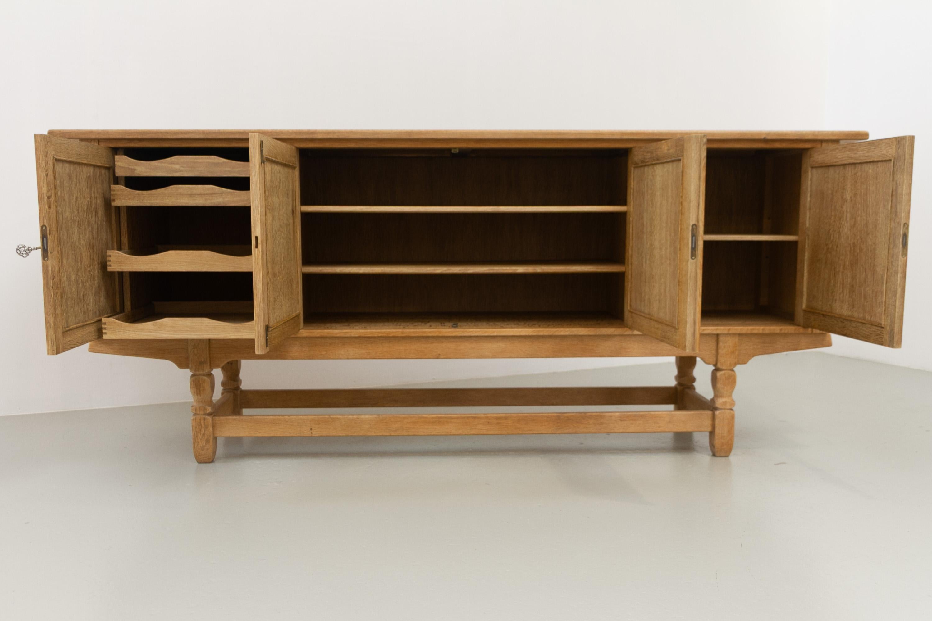 Danish Brutalist Low Oak Sideboard attributed to Henning Kjærnulf, 1960s. For Sale 5