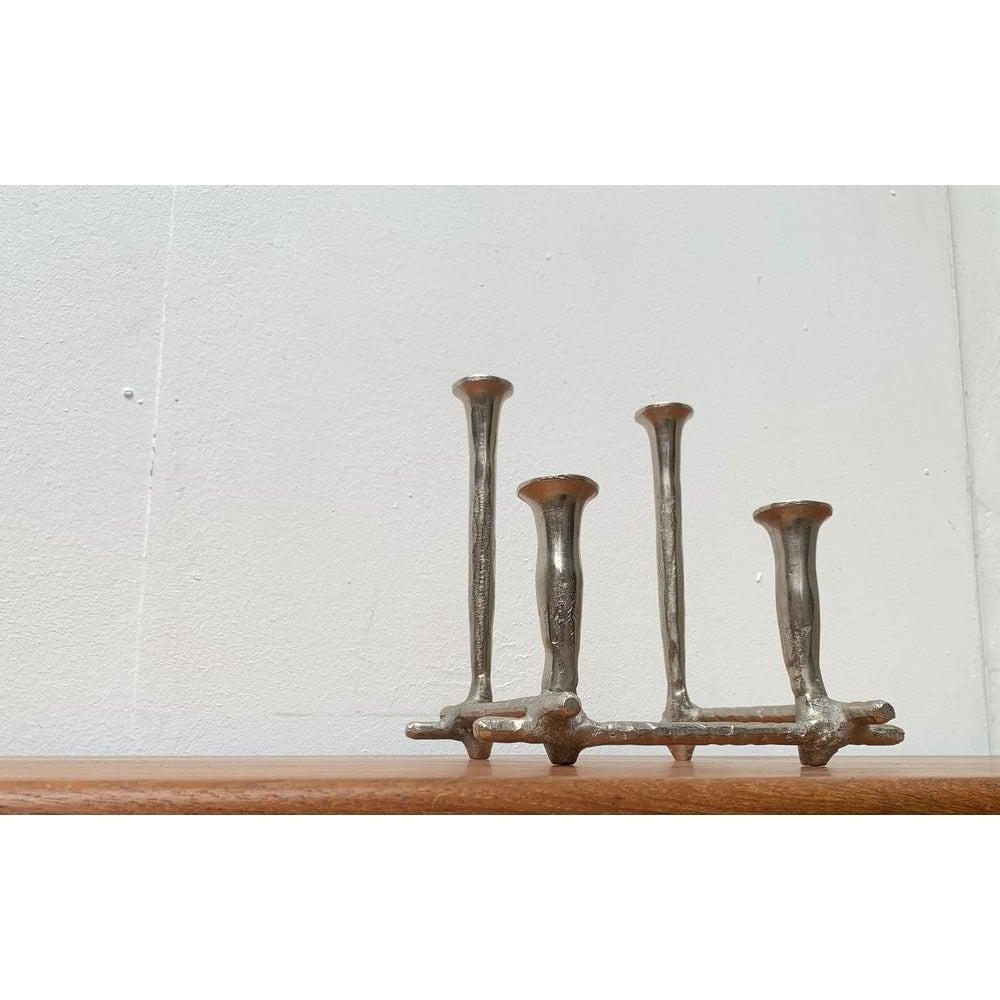Danish Brutalist Sculptural Cast Aluminum Candleholder, in Very Good conditions. Designed 1960 to 1969.

Additional information:
Materials: Aluminium
Color: Silver
Styles: Brutalist
Item Type: Vintage, Antique or Pre-owned
Dimensions: 10.63ʺW ×