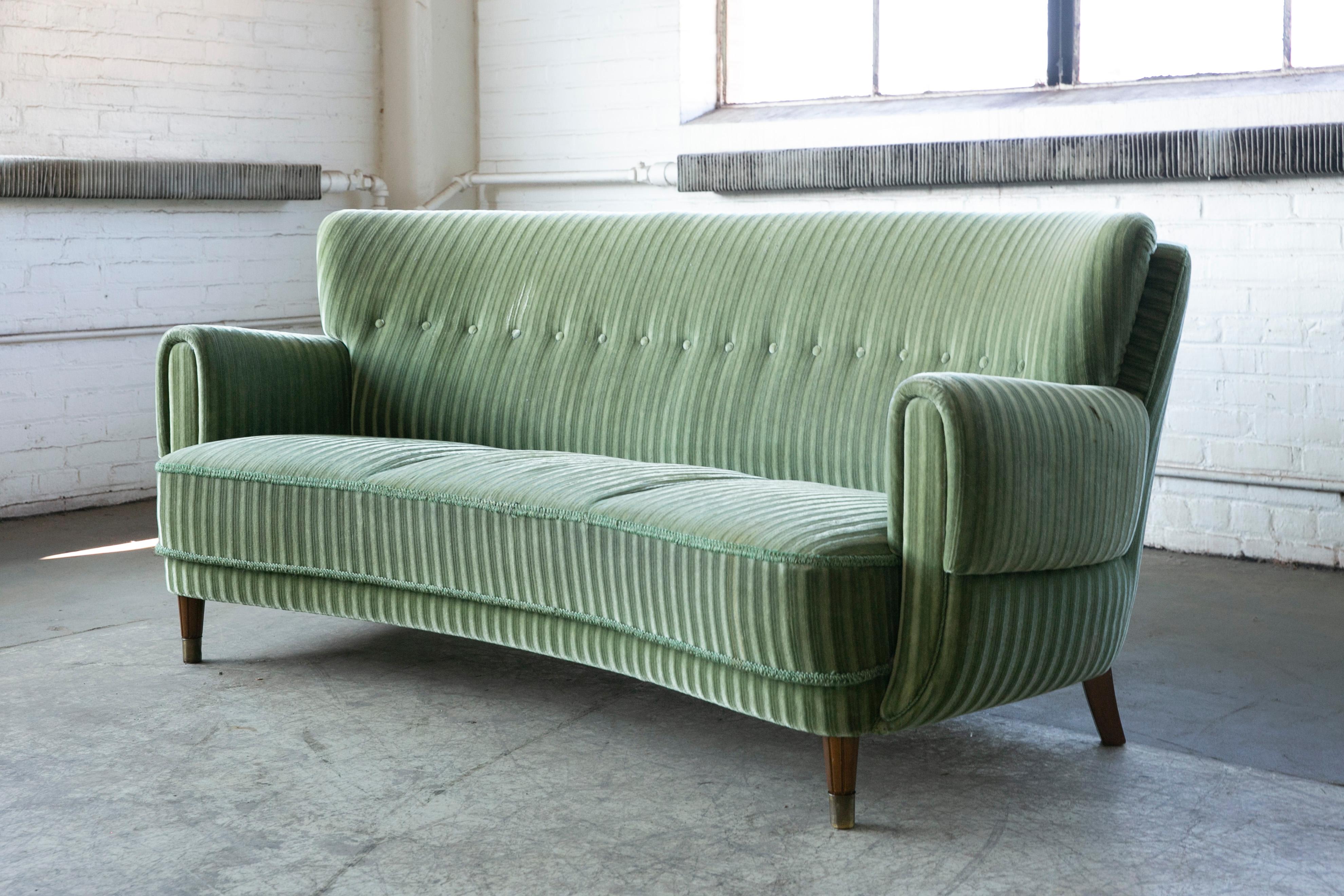 Mid-Century Modern Danish Ca. 1950 Curved Sofa in Green Mohair and Brass Capped Legs
