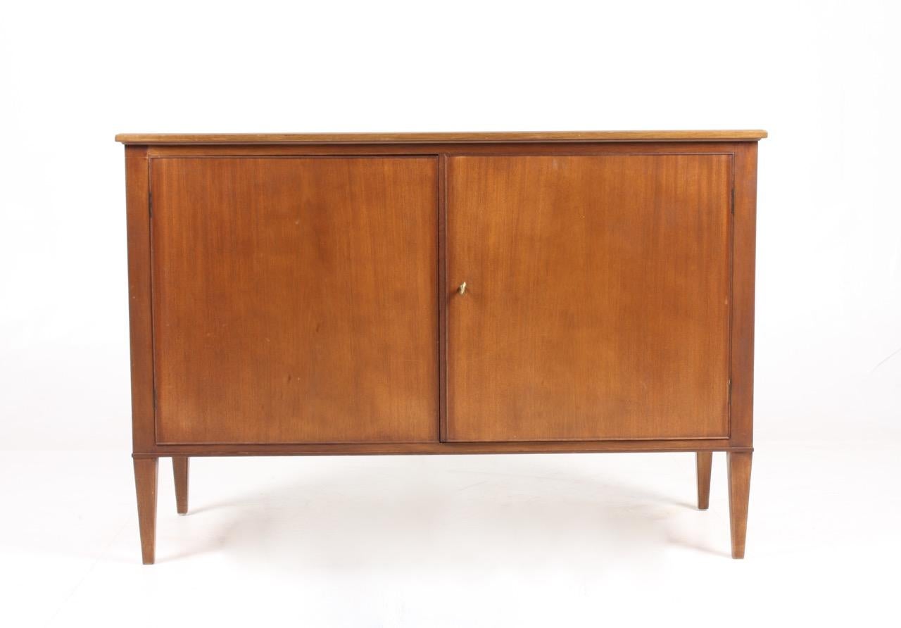 Cabinet in mahogany, designed and made by Cabinetmaker Frits Henningsen. Great original condition, circa 1940s.