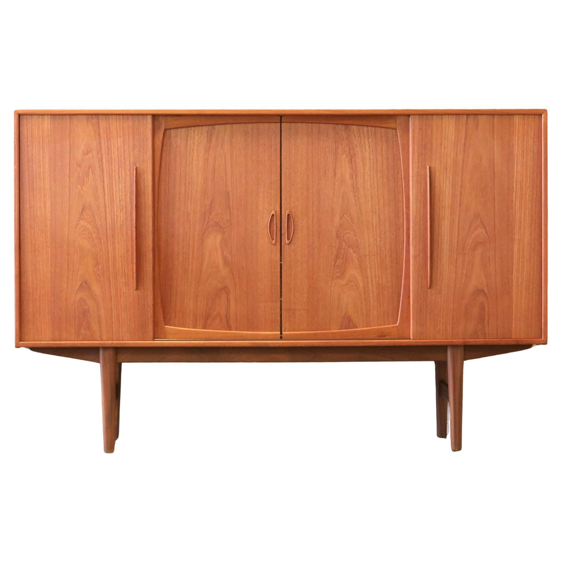 Danish cabinet in teak with sliding doors and bar cabinet