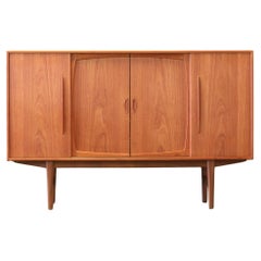 Used Danish cabinet in teak with sliding doors and bar cabinet