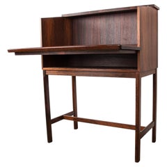 Mobile danese con funzione di bar e segreteria in palissandro Hans Olsen 1960.
