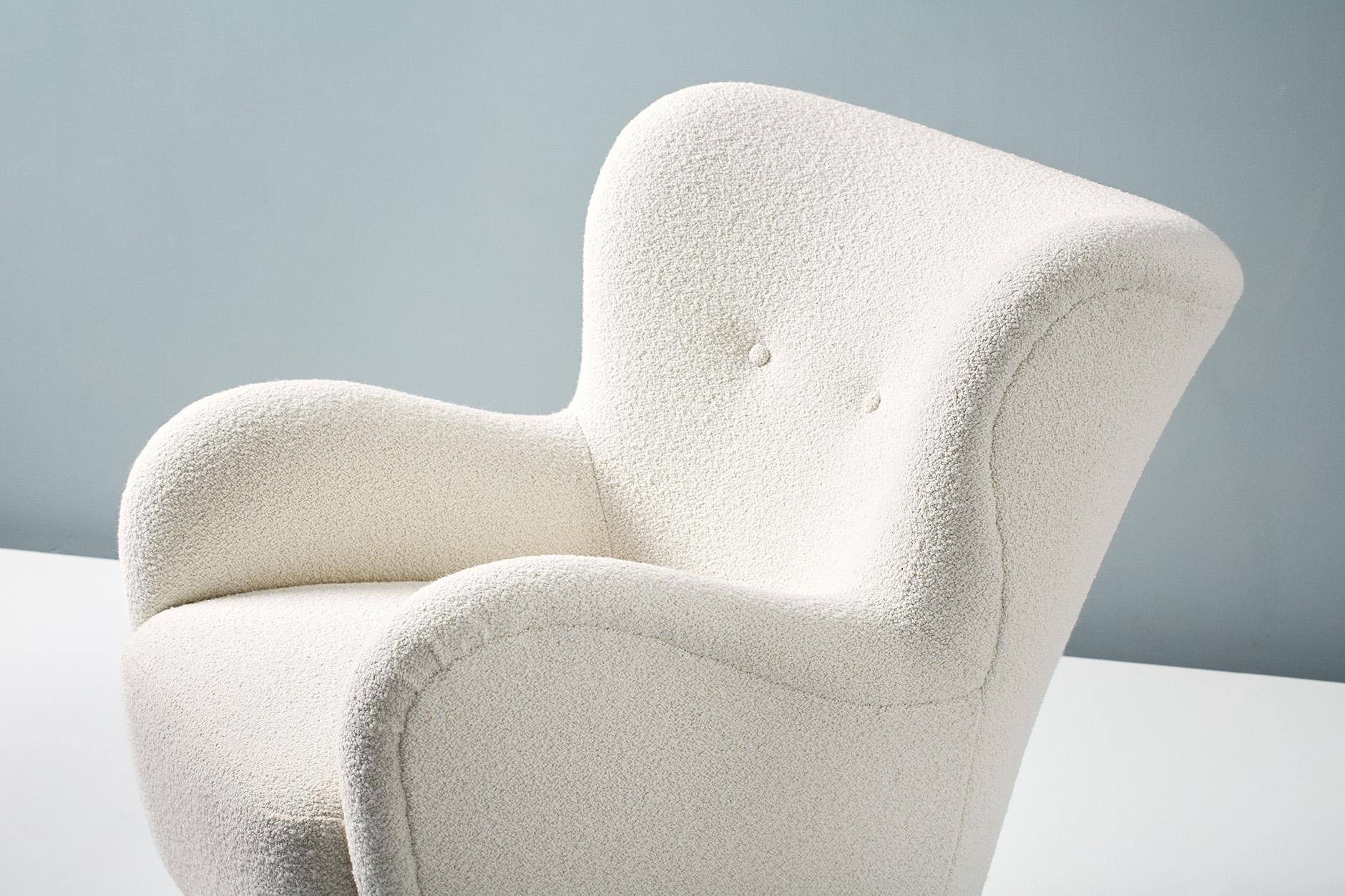 A Danish Cabinetmaker 1940s lounge chair reupholstered in luxurious cotton-wool blend off-white bouclé fabric from Chase Erwin in England. 

This chair was made in Denmark in the 1940s in the manner of Flemming Lassen, Fritz Hansen or Frits