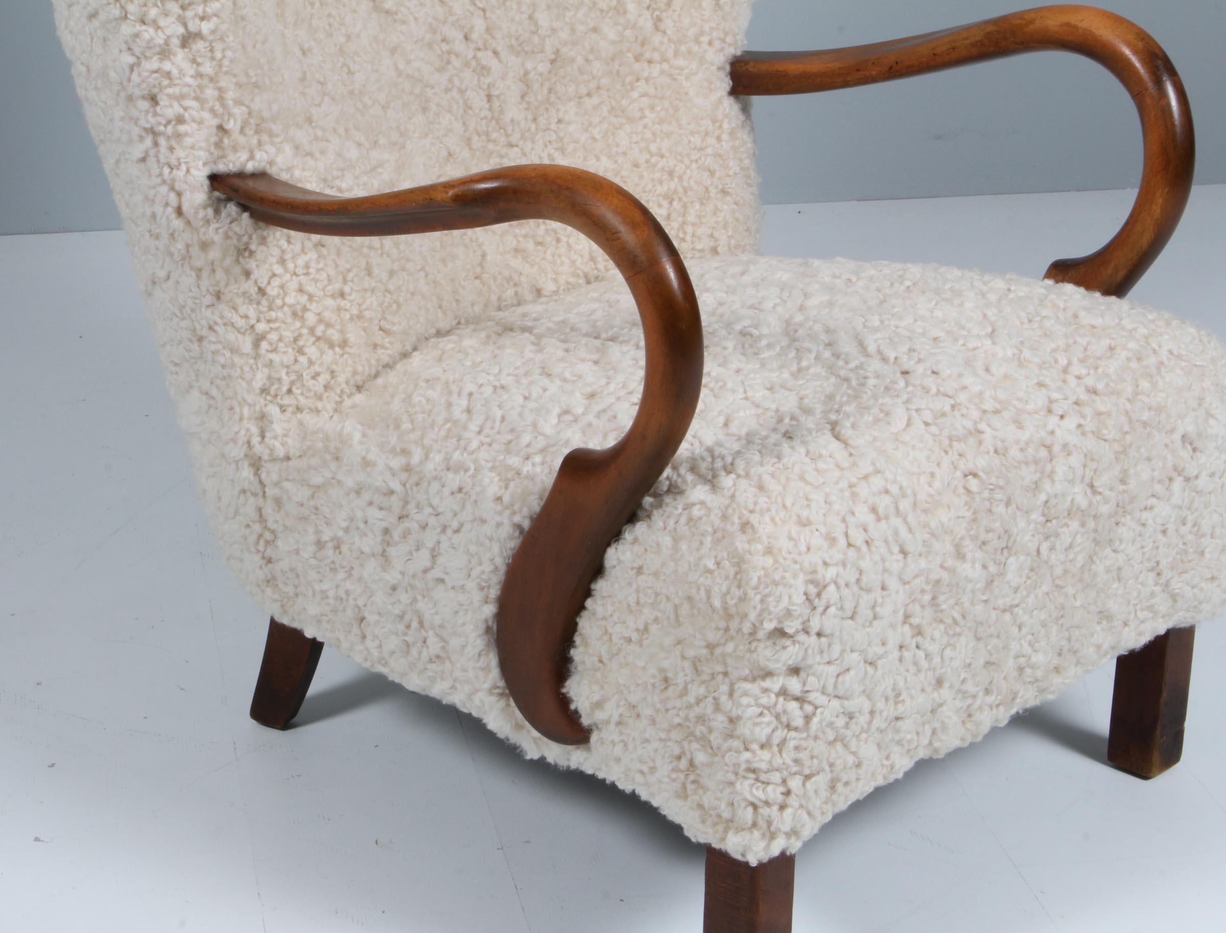 Scandinavian Modern Danish Cabinetmaker 1940s Lounge Chair, Lambskin For Sale
