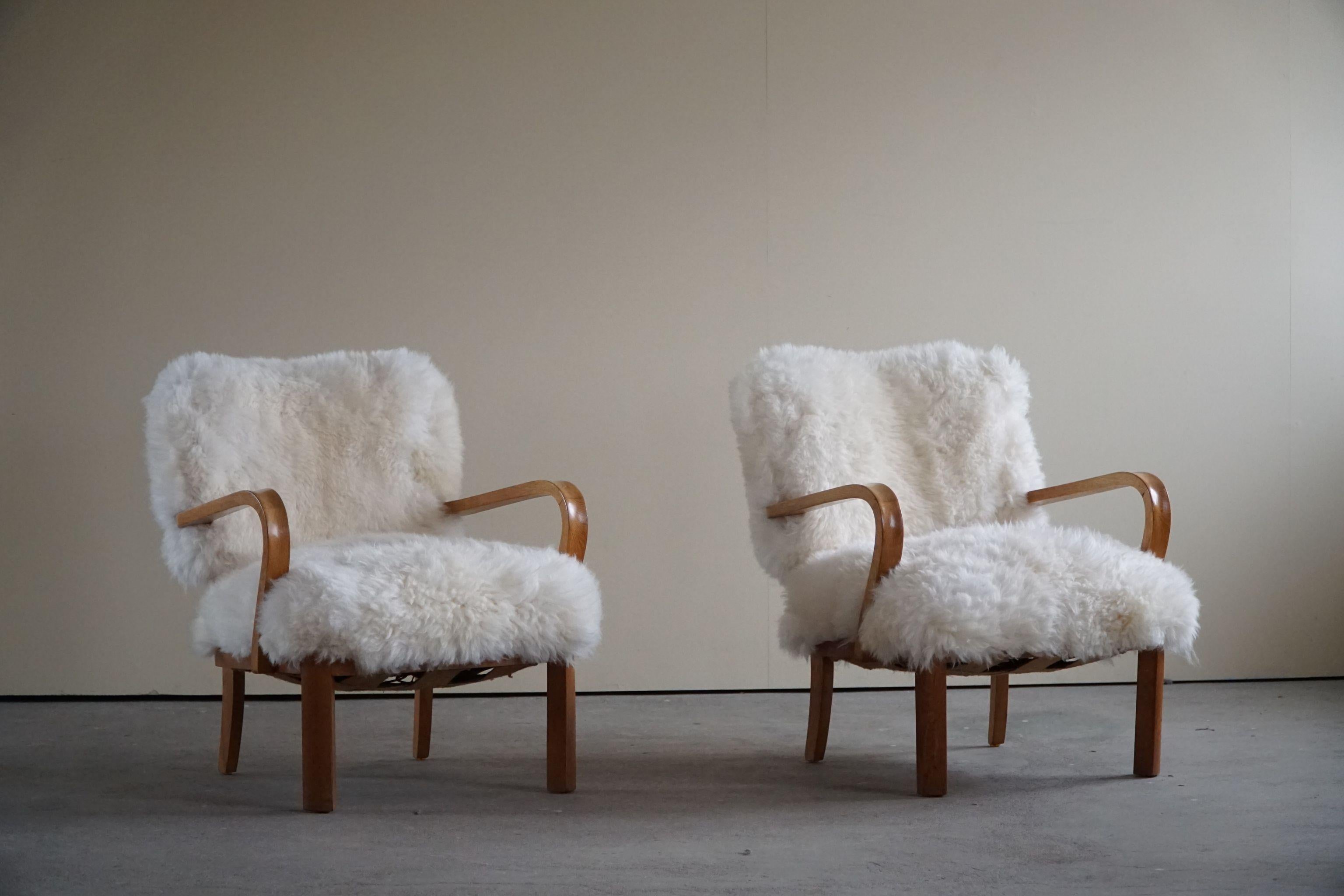 Danish Cabinetmaker, a Modern Pair of Lounge Chairs in Lambswool and Oak, 1950s 12