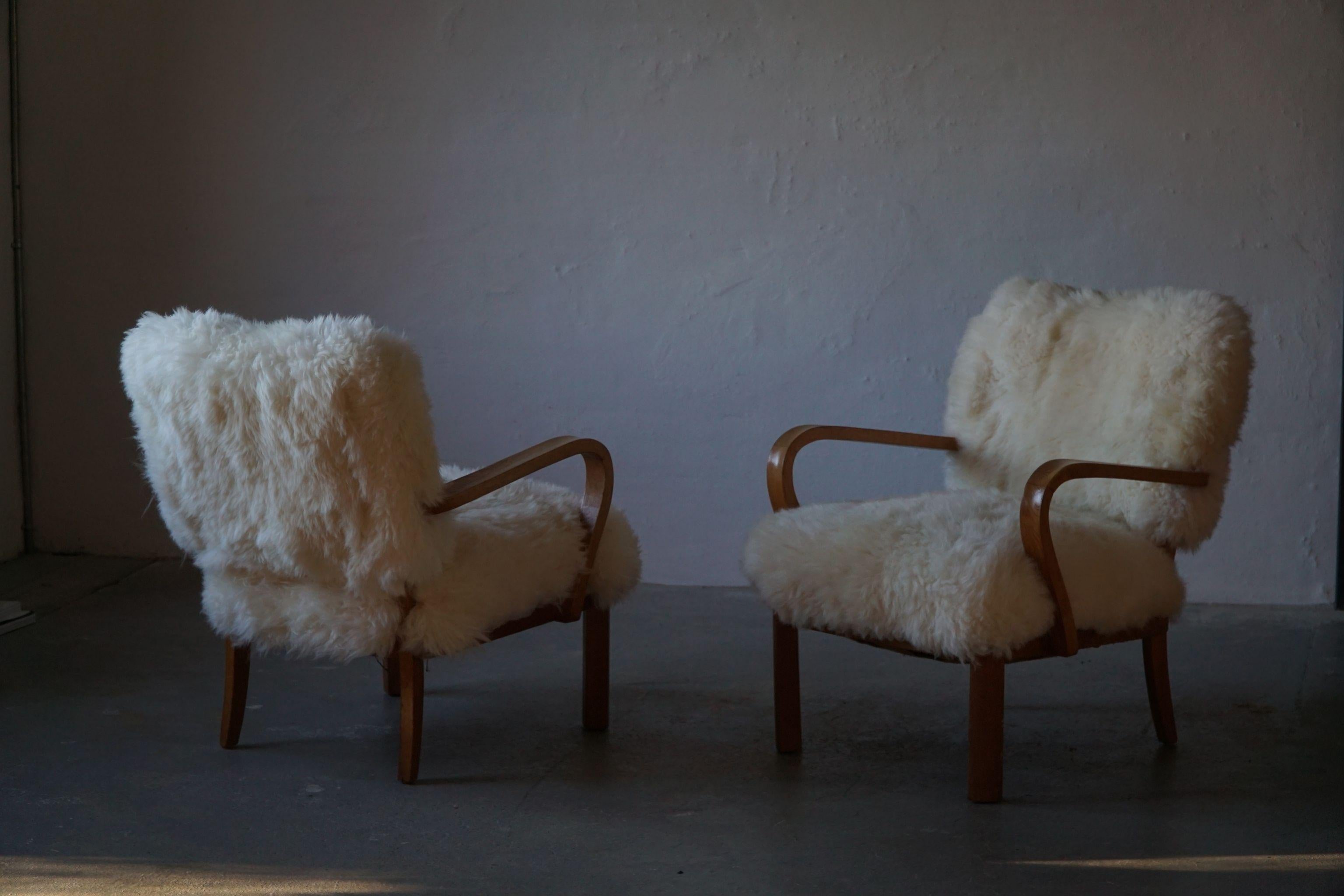 Danish Cabinetmaker, a Modern Pair of Lounge Chairs in Lambswool and Oak, 1950s 13