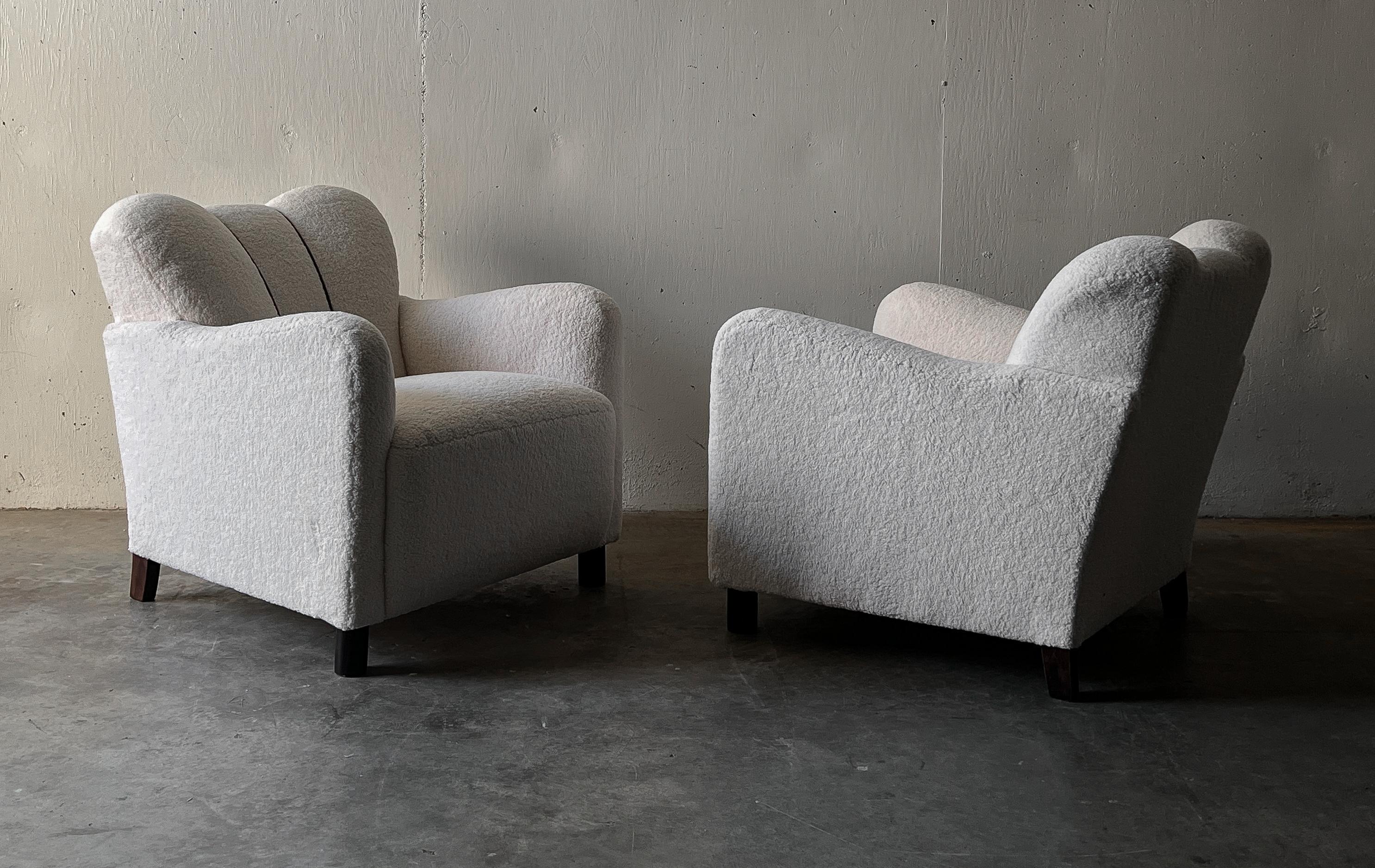Pair of easy chairs Upholstered with Light Bouclé from Denmark 1930-40s in mint conditions. Very comfortable.