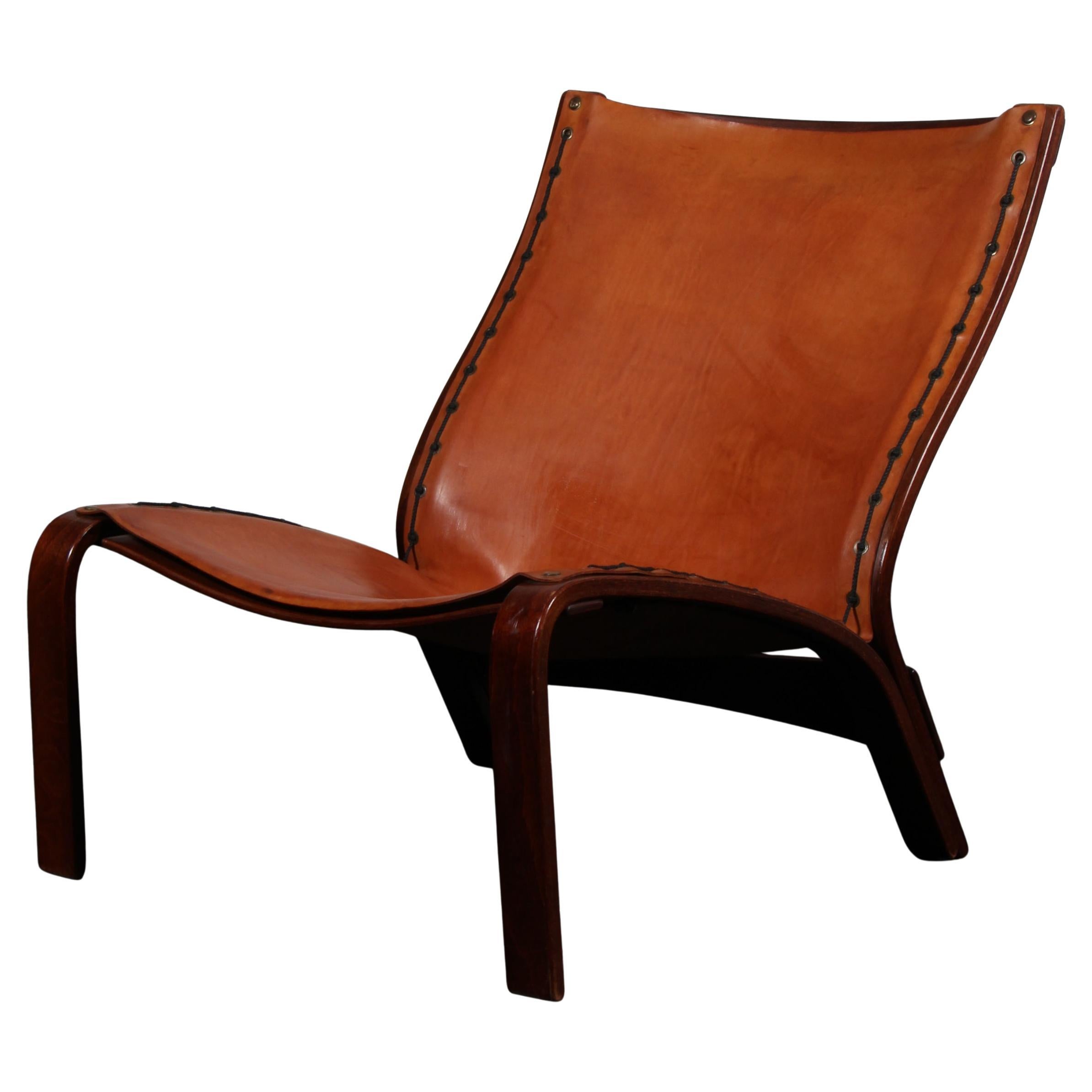 Danish Cabinetmaker lounge chair in beech and butthide leather. 1970s For Sale