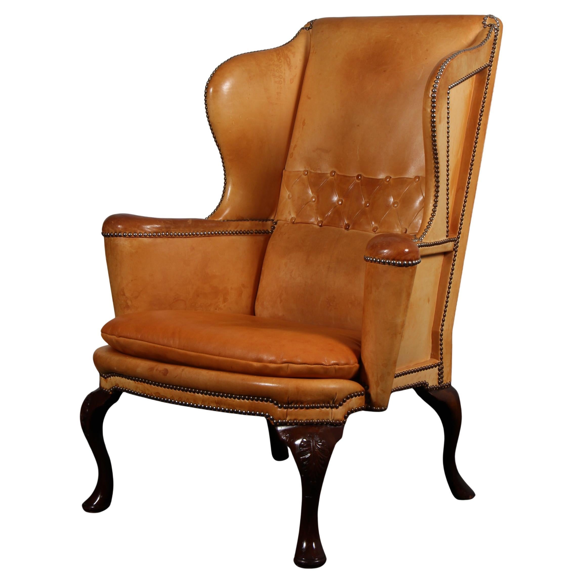 Danish Cabinetmaker lounge chair with baroque legs, nature leather, 1930
s For Sale