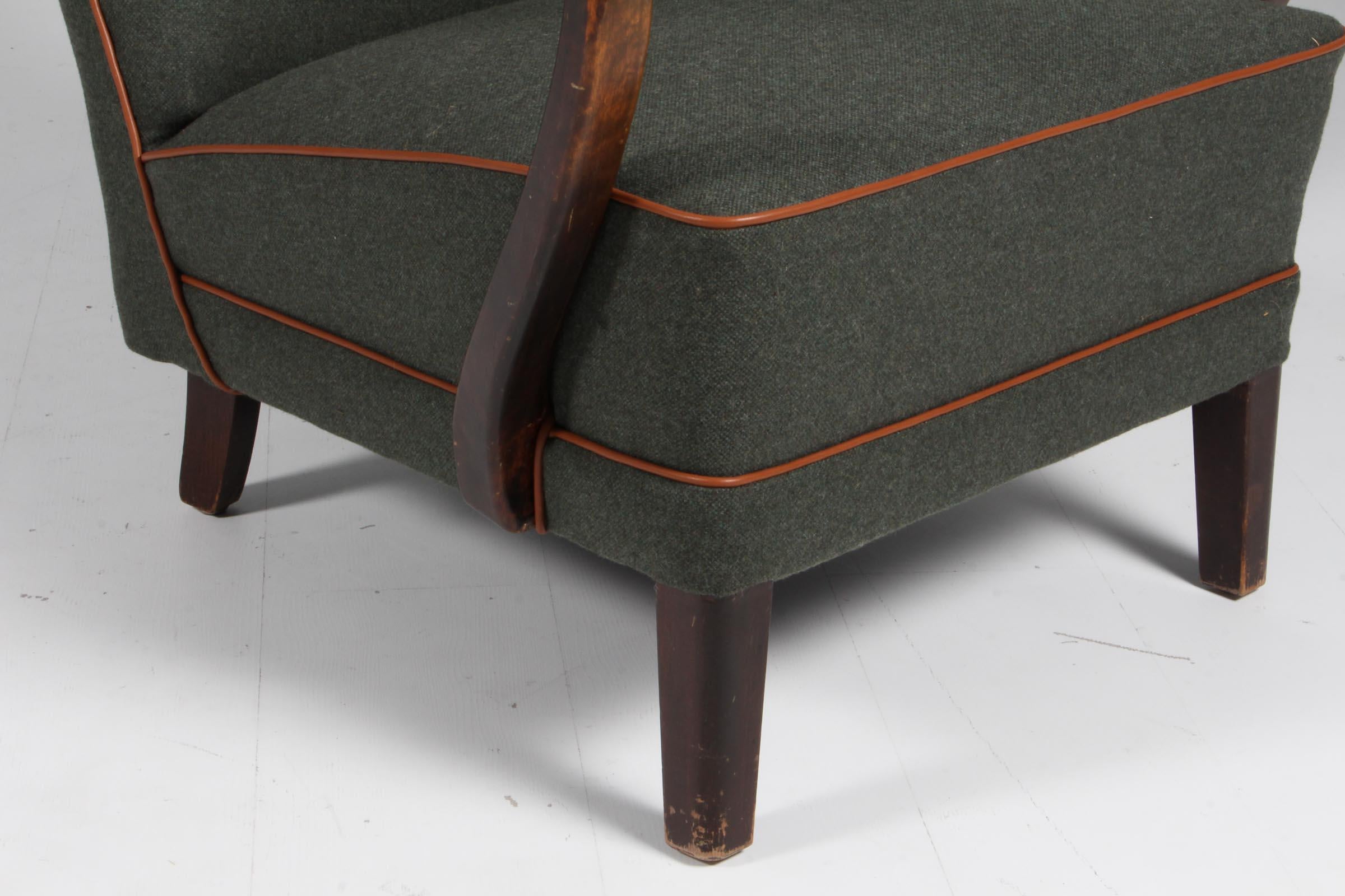 Finnish Danish cabinetmaker, lounge chair with wool and aniline leather. 1940s