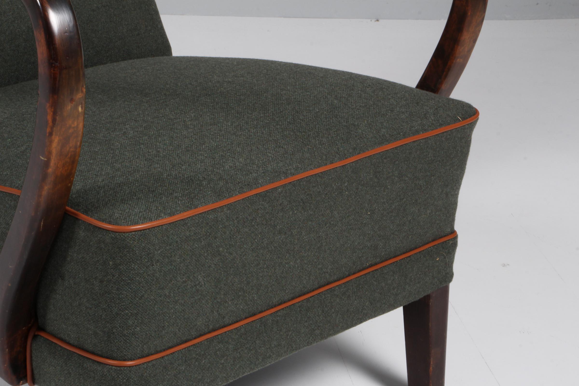 Mid-20th Century Danish cabinetmaker, lounge chair with wool and aniline leather. 1940s