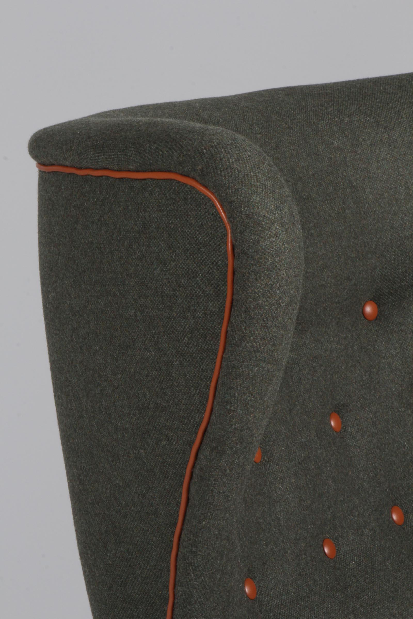 Fabric Danish cabinetmaker, lounge chair with wool and aniline leather. 1940s
