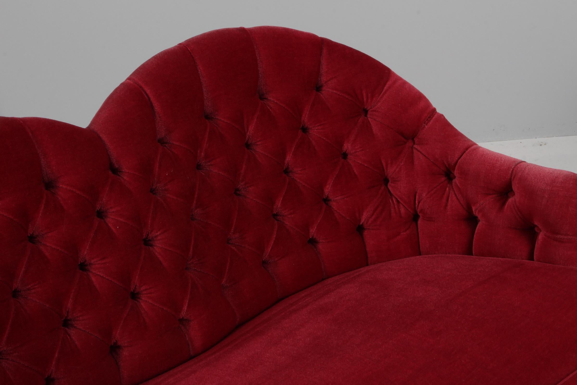 Scandinavian Modern Danish cabinetmaker loveseat sofa, red velvet. Denmark 1940s