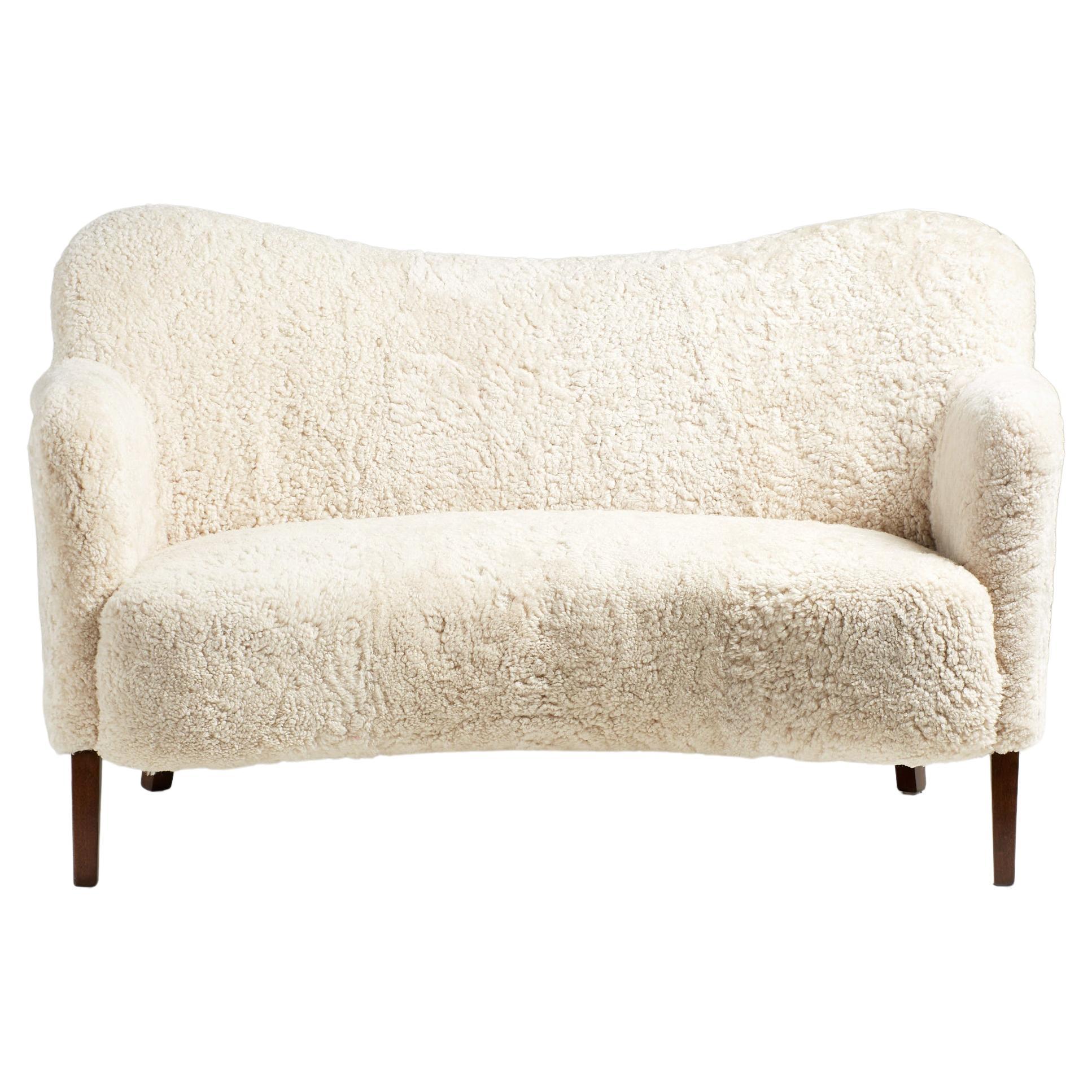 Danish Cabinetmaker Sheepskin Love Seat Sofa, circa 1950s