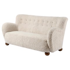 Dänisches Schreiner-Schreiner-Sofa aus Schafsleder mit Kugelfüßen, ca. 1940er Jahre