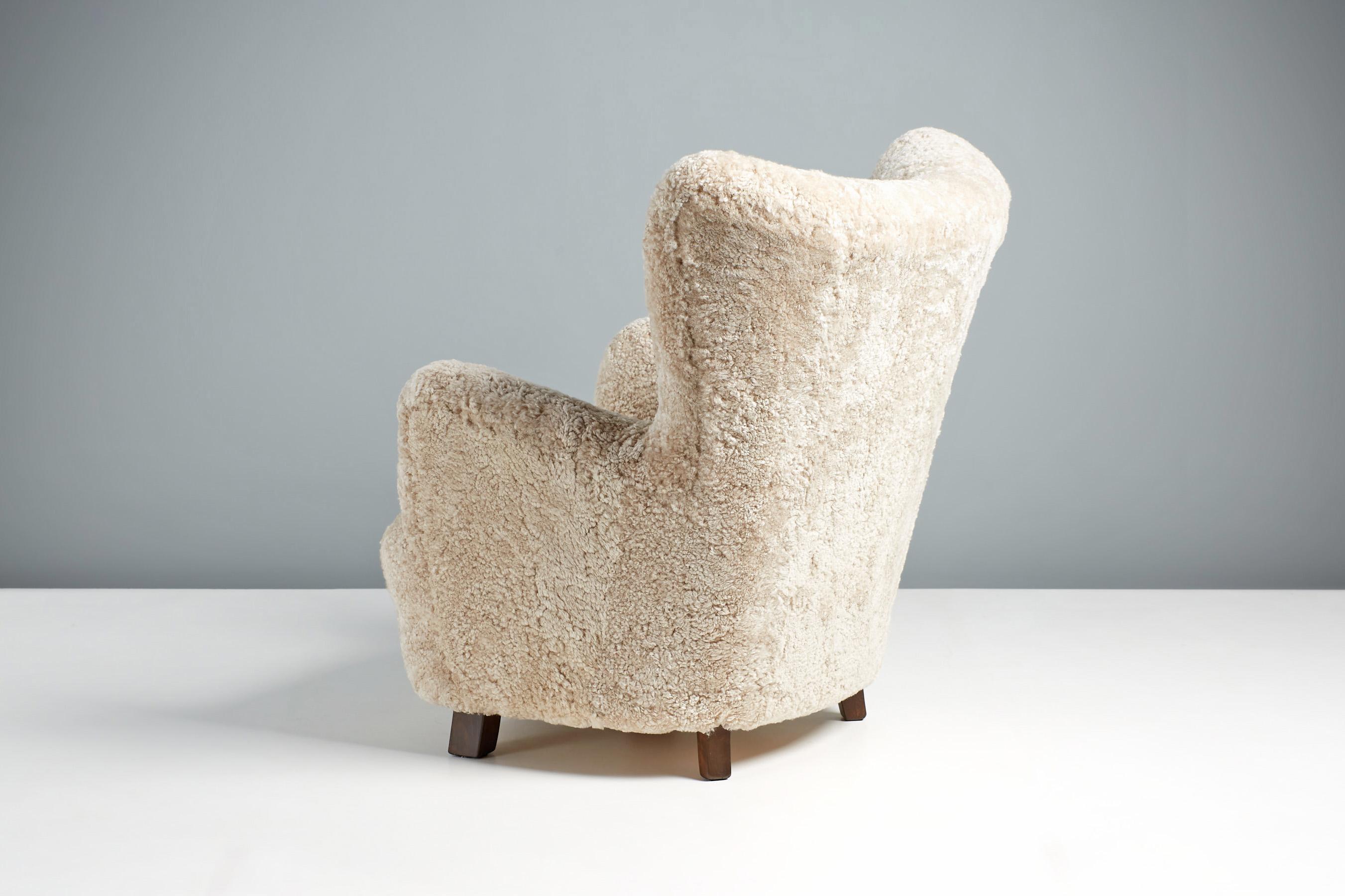 European Danish Cabinetmaker Tall Sheepskin Armchair, circa 1940s