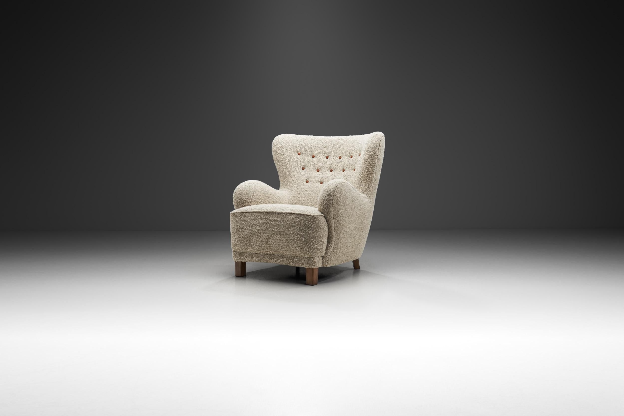 This unique armchair is a great representation of the quality and craftsmanship of Danish master cabinetmakers and the immediately recognizable characteristics of Scandinavian design. Particularly visible here is Danish designers’ predilection for