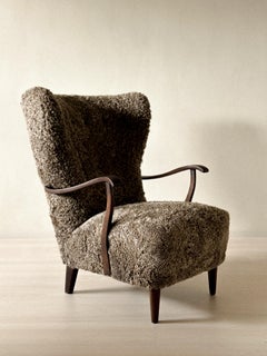 Danish Cabinetmaker Wing Back Chair in Sheepskin, Denmark, 1940s