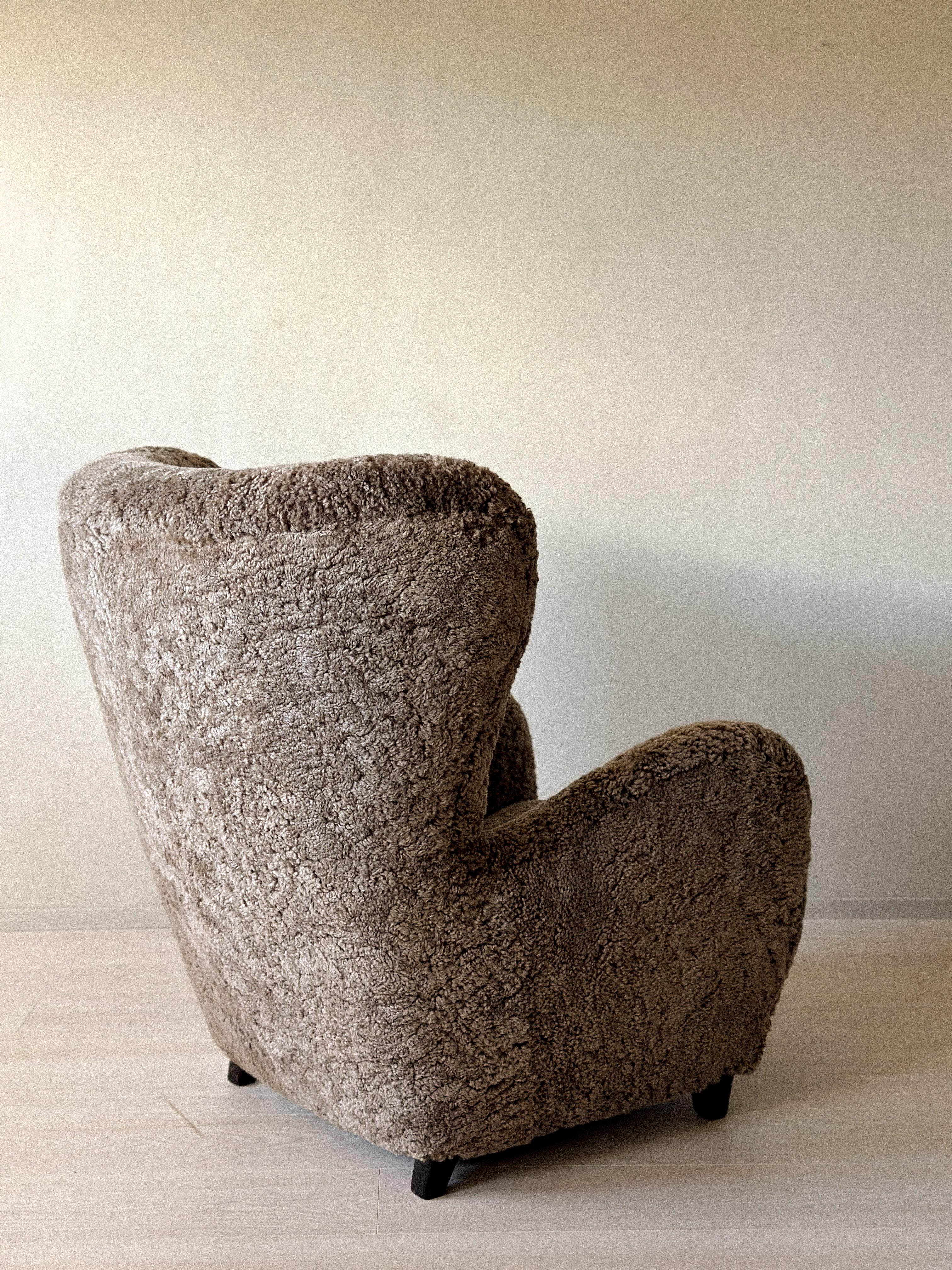 Mid-20th Century Danish Cabinetmaker Wing Back Chair in Sheepskin, Denmark, 1940s