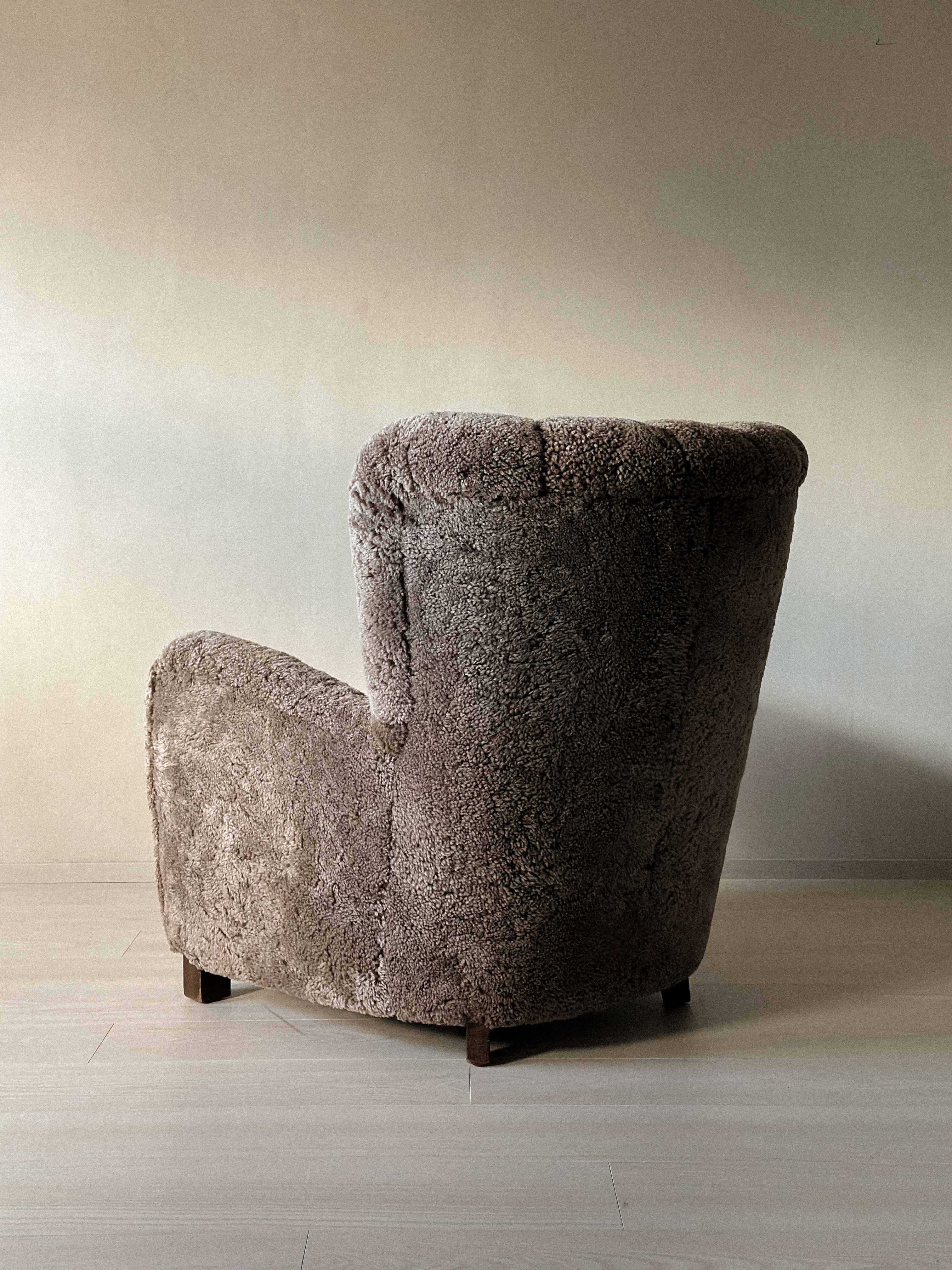 Mid-20th Century Danish Cabinetmaker Wing Back Chair in Sheepskin, Denmark, 1940s