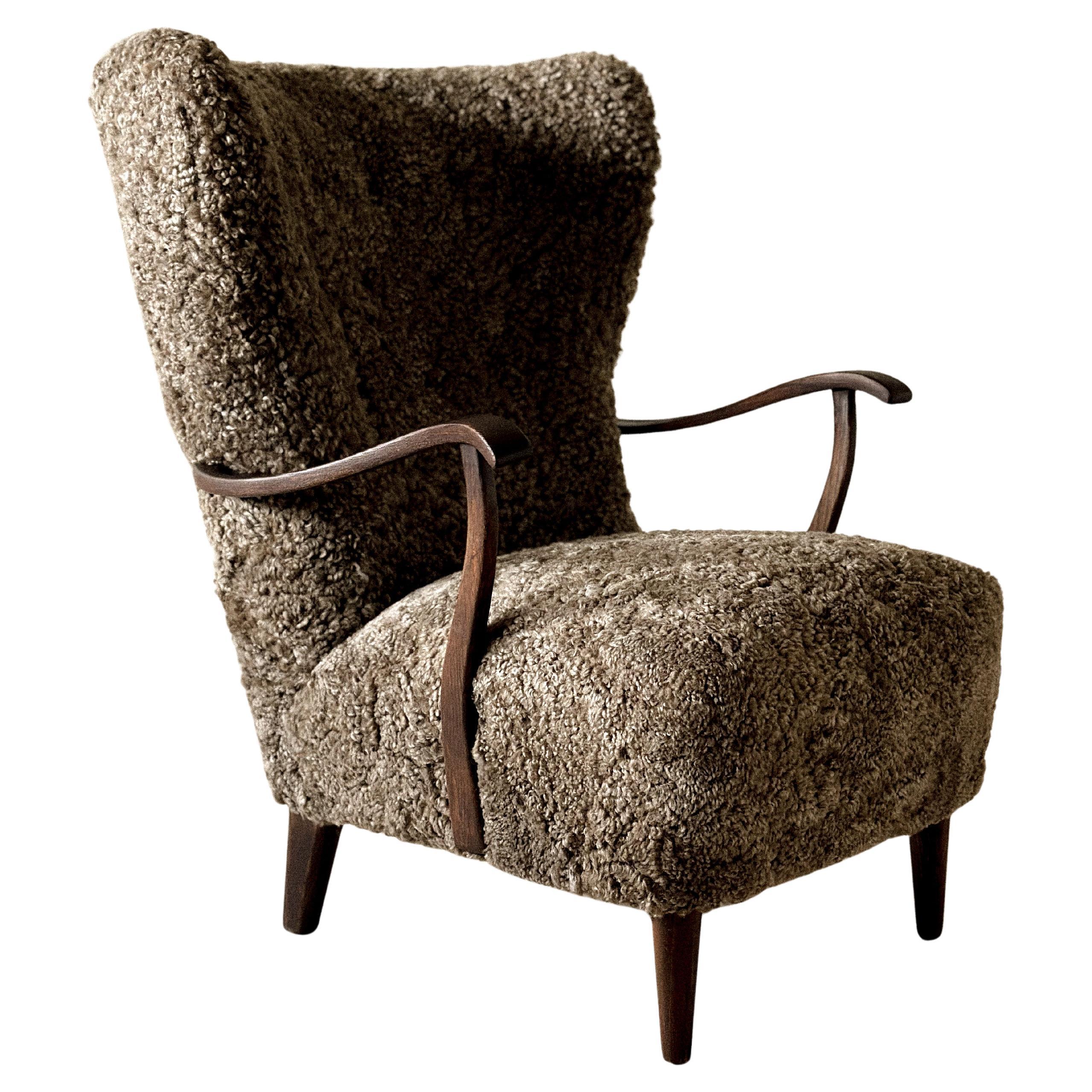 Danish Cabinetmaker Wing Back Chair in Sheepskin, Denmark, 1940s
