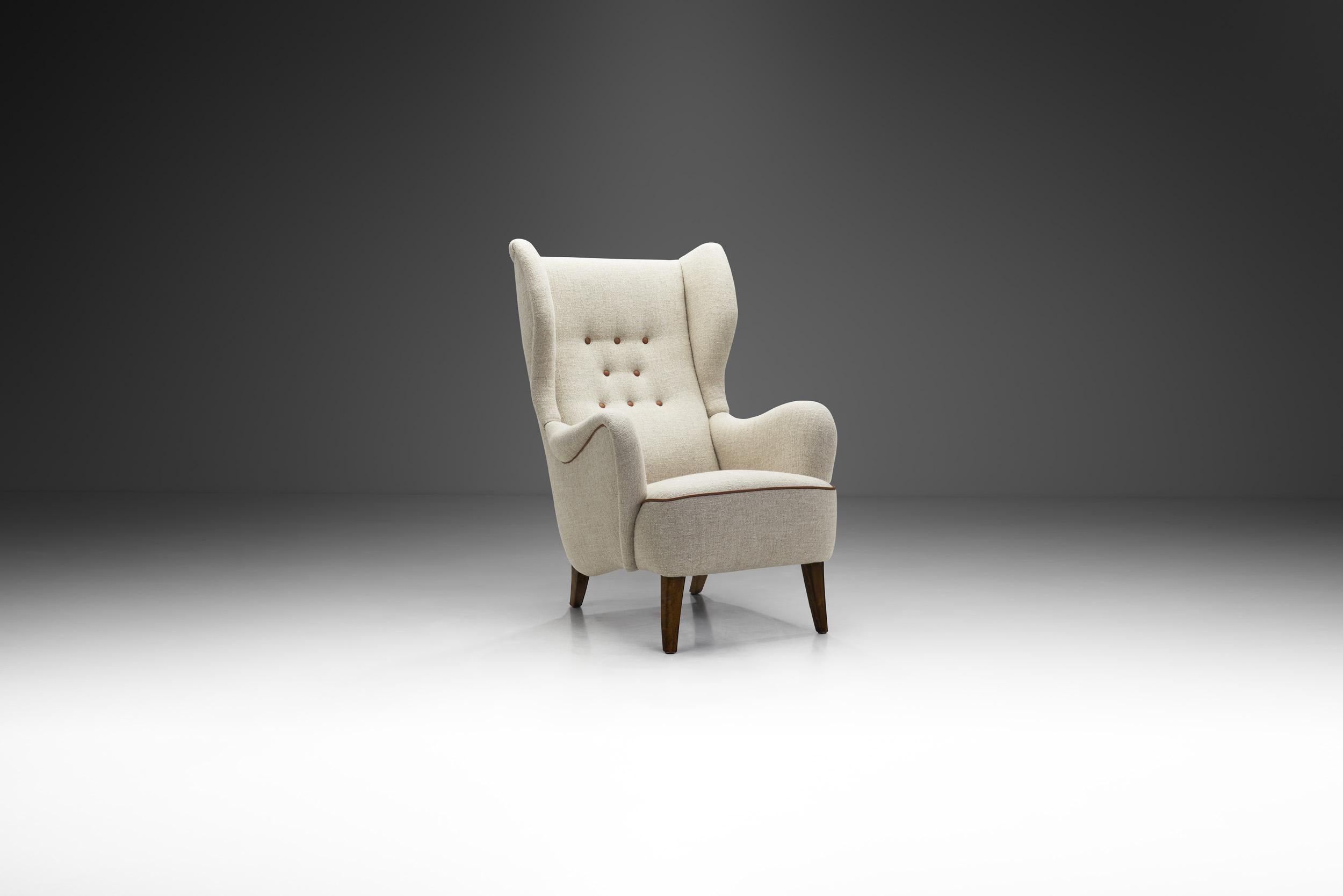 Simplicity, functionality, and elegance - these are the basic aspects of Danish design and accordingly, of this sophisticated wing-back chair. This unique model is a great representation of the quality and craftsmanship of Danish master
