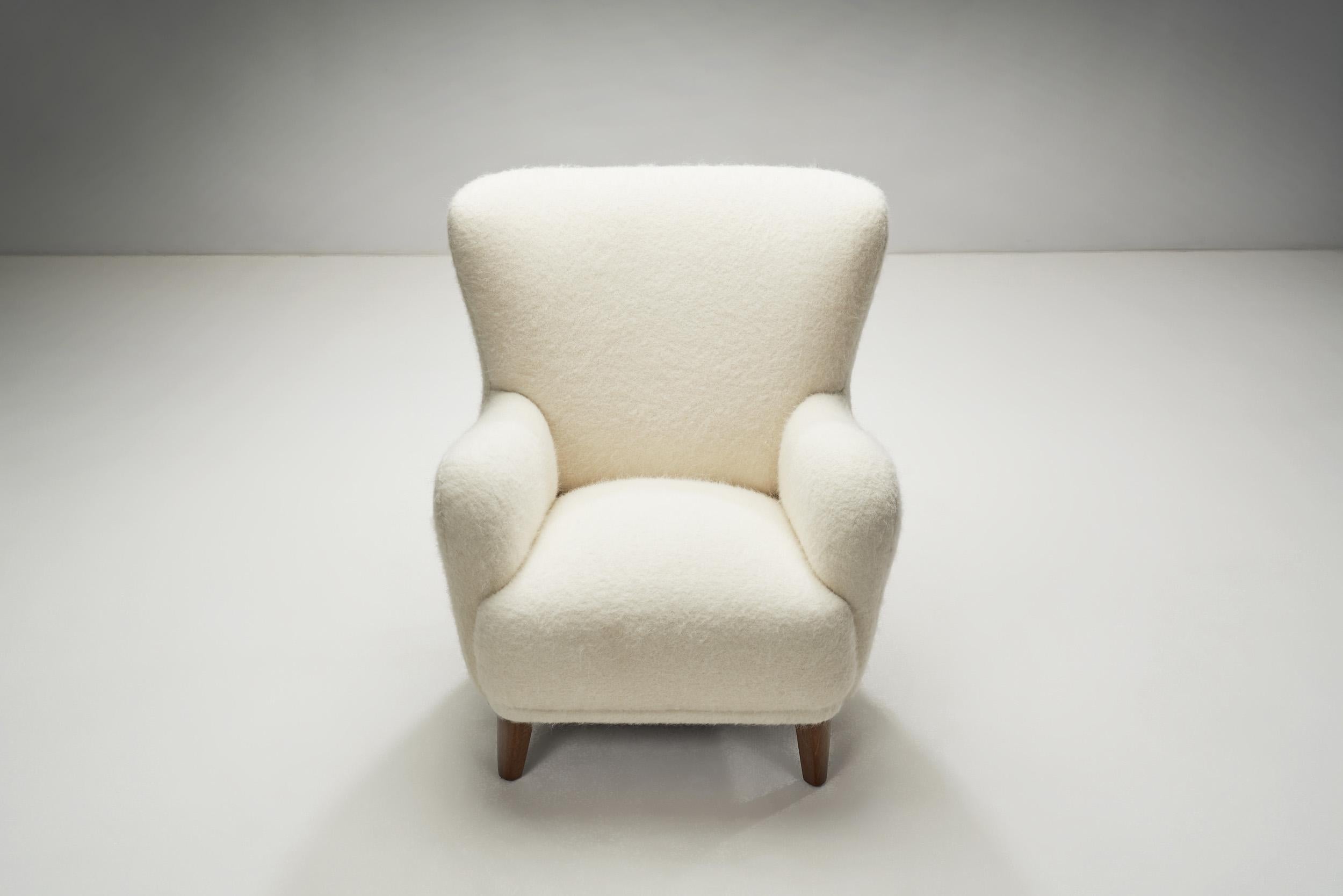 Danish Cabinetmaker Wingback Chair with Stained Wood Legs, Denmark, ca 1950s 1
