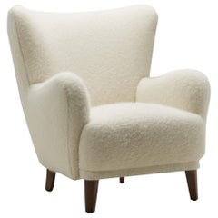 Danish Cabinetmaker Wingback Chair with Stained Wood Legs, Denmark, ca 1950s