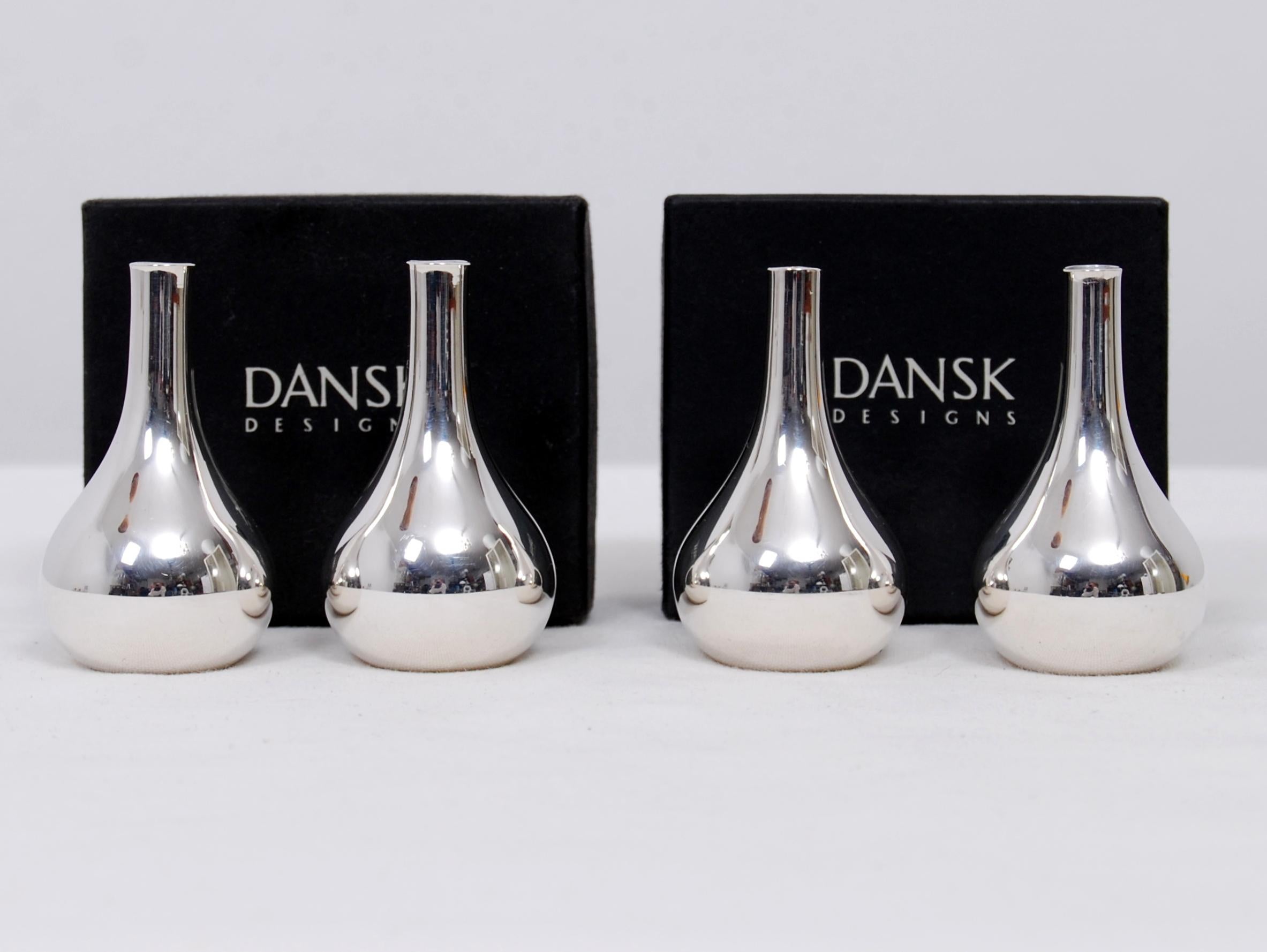 A set of two pairs of Dansk design silver plated taper sticks or candleholders designed by Jens Quistgaard, marked Dansk Design Denmark, IHQ. Original packing boxes included. Excellent vintage condition.









 