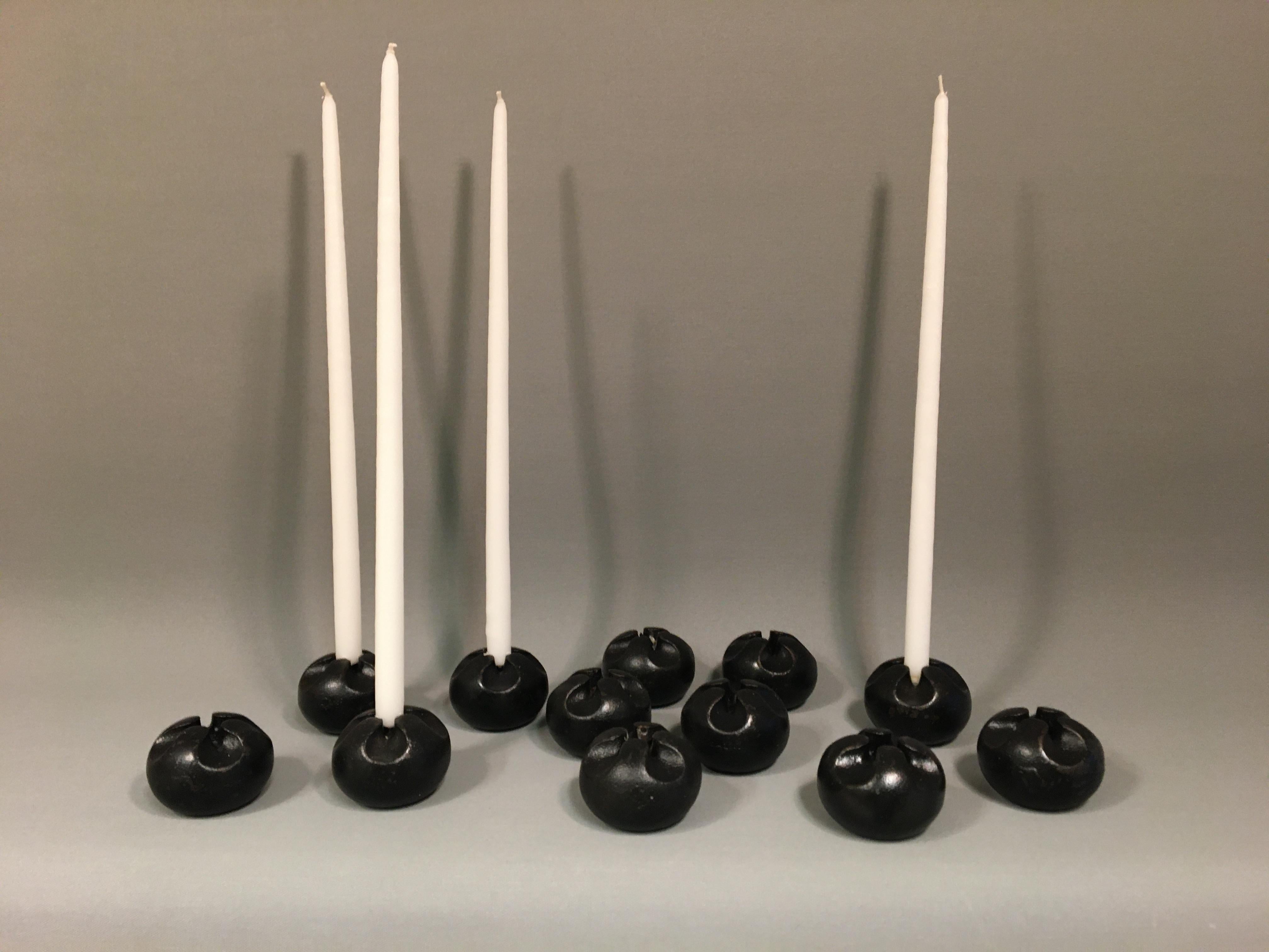 Black beautiful 'Flowerbud' candlesticks in solid cast iron.
Made into thin candles.
Design: Christel & Christer Holmgren for Illums Bolighus.
Marked Made in Denmark Pat. Pend.
Dimensions: Ø6 cm, H 4 cm.
The price is a piece.