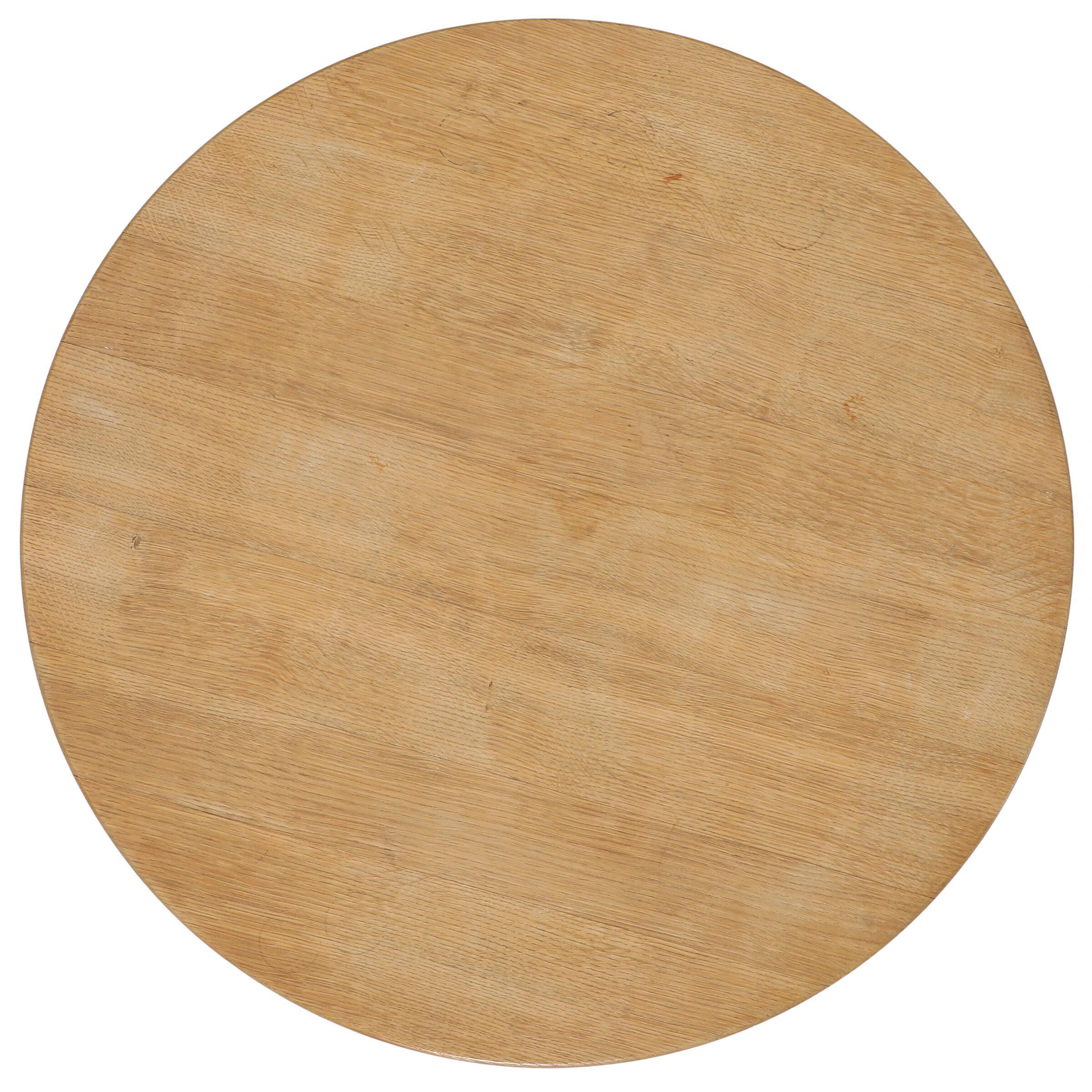 Round carved solid oak Danish coffee table . 