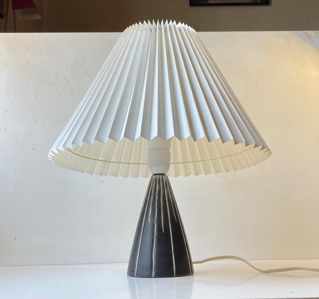 - Striped ceramic table lamp often attributed Svend Aage Holm-Sorensen and Svend Aage Madsen. - Slate grey main glaze decorated with vertical white stripes. - Manufactured by Søholm Keramik in Denmark from 1956-62 -Reminiscent in style to Ingrid