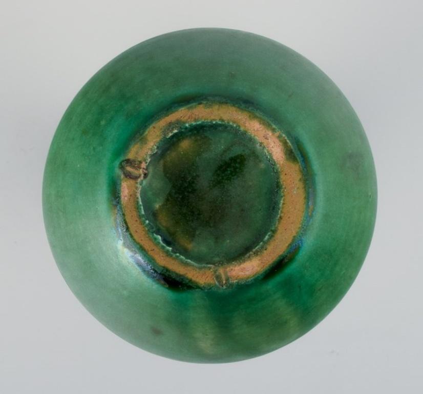 Danish ceramicist. Ceramic vase with glaze in green tones. Mid-20th century. For Sale 1