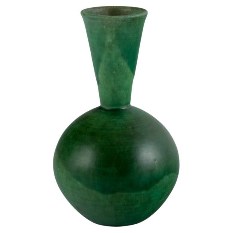 Danish ceramicist. Ceramic vase with glaze in green tones. Mid-20th century. For Sale