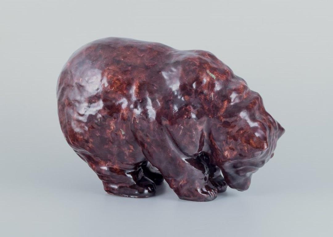 Glazed Danish ceramicist. Large ceramic bear. Glaze in red-brown shades. For Sale
