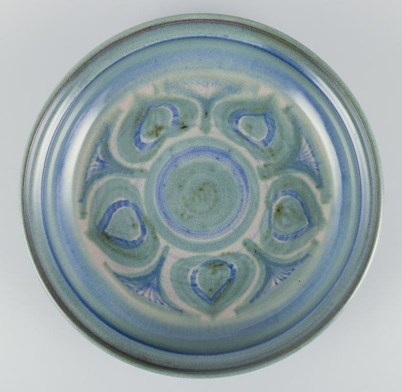 Glazed Danish ceramicist. Large ceramic bowl. Glaze in blue and green tones. For Sale