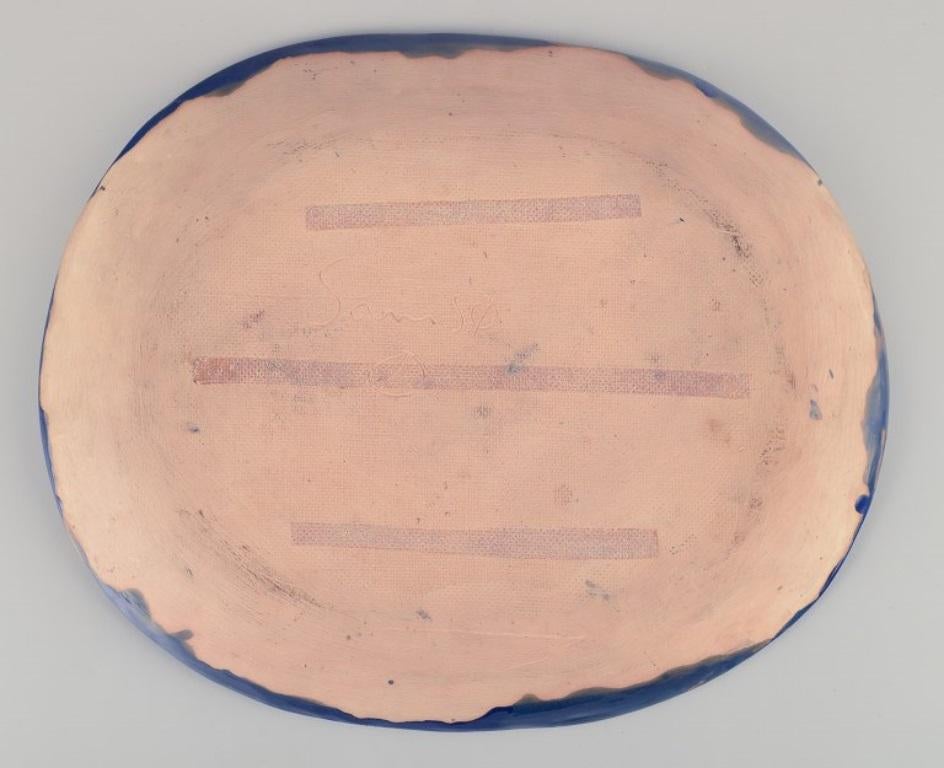 Ceramic Danish ceramicist. Unique ceramic dish. Motif of a floating couple. For Sale