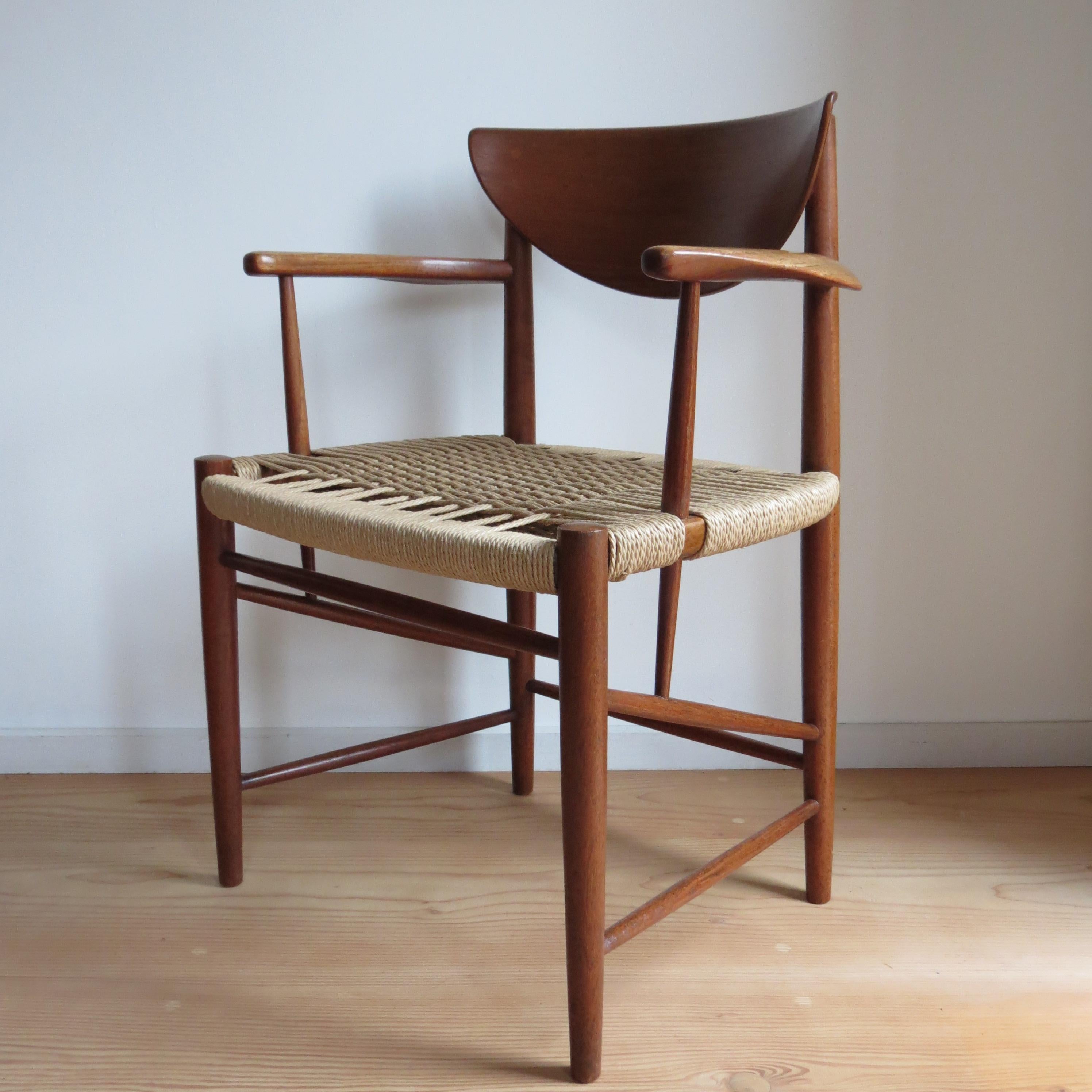 Original Danish chair designed by Peter Hvidt and Orla Molgaard-Nielsen for Soborg Mobelfabrik, Denmark. Model Number 317. Originally designed in 1956, this is an early edition. Made from solid Teak frame, newly recorded seat using a Japanese style